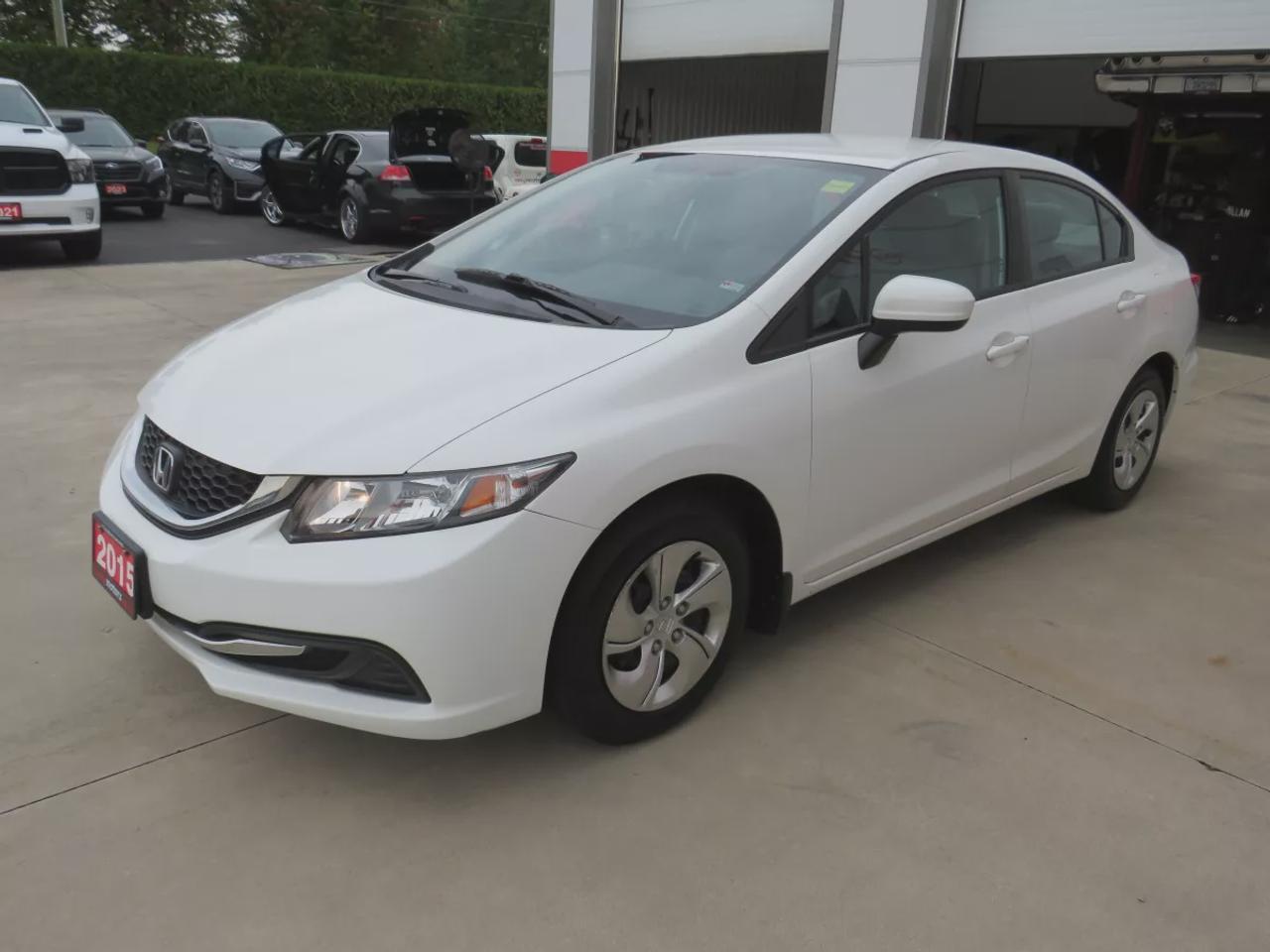 2015 Honda Civic Sedan LX | LOW KM!! | FWD | Automatic | Heated Seats | Air Conditioning | Bluetooth | Back-Up Camera | Cruise Control | Steering Wheel Audio Controls | USB Input | Keyless Entry | Power Windows | Power Door Locks | Heated Power Mirrors Photo
