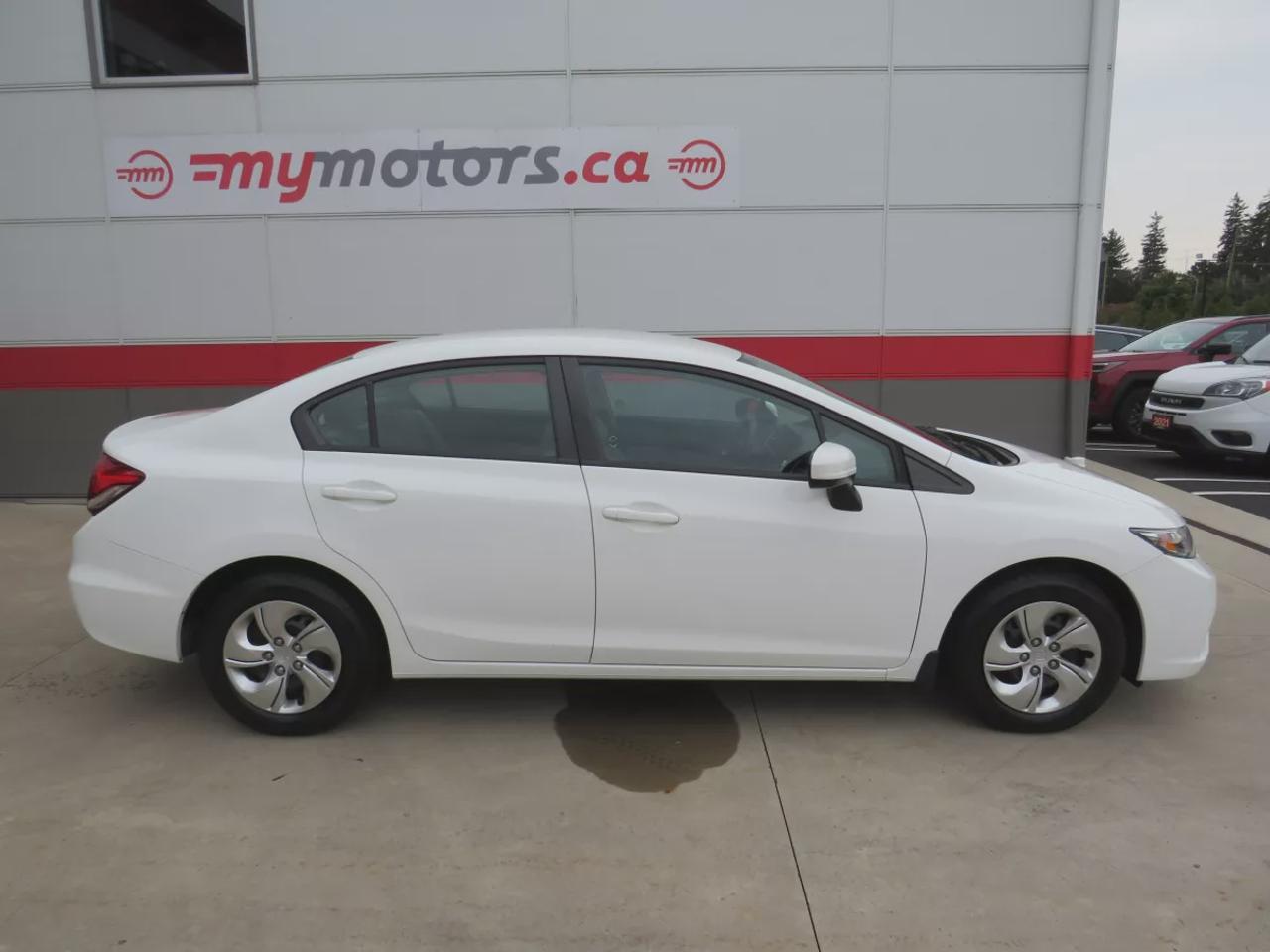 2015 Honda Civic Sedan LX | LOW KM!! | FWD | Automatic | Heated Seats | Air Conditioning | Bluetooth | Back-Up Camera | Cruise Control | Steering Wheel Audio Controls | USB Input | Keyless Entry | Power Windows | Power Door Locks | Heated Power Mirrors Photo