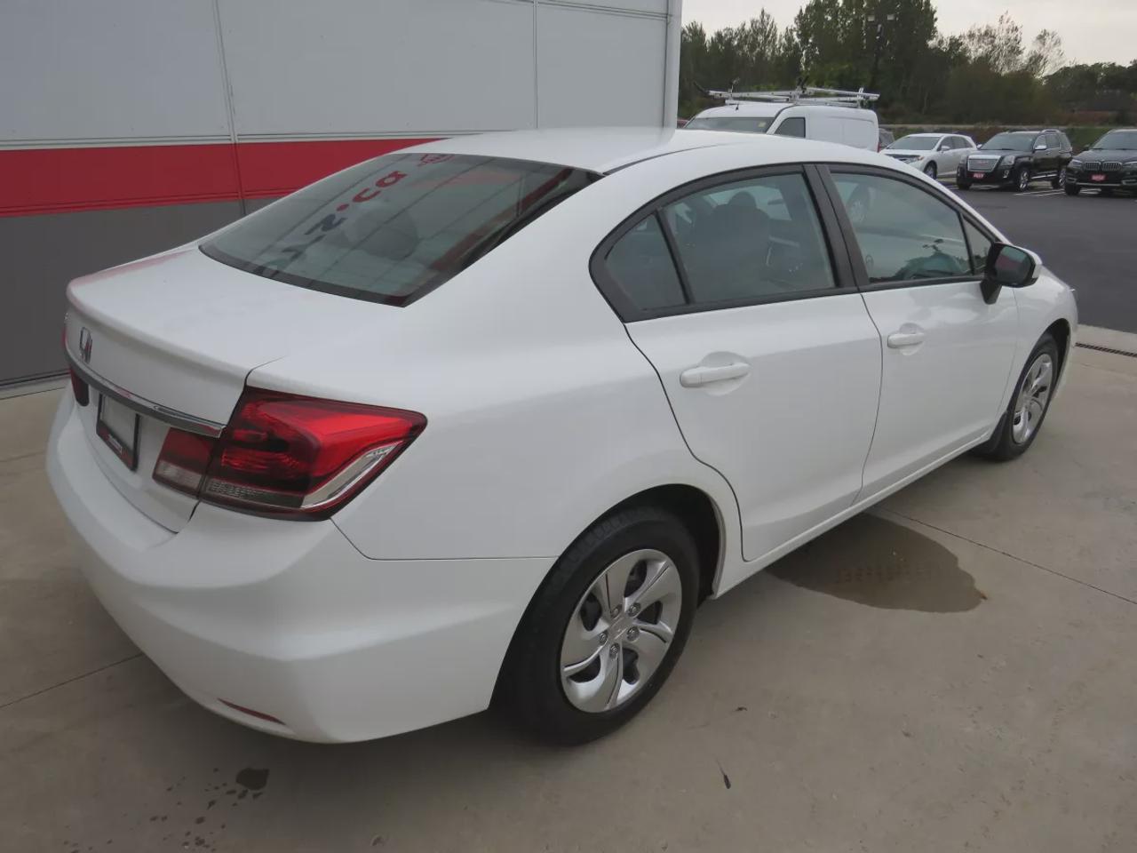 2015 Honda Civic Sedan LX | LOW KM!! | FWD | Automatic | Heated Seats | Air Conditioning | Bluetooth | Back-Up Camera | Cruise Control | Steering Wheel Audio Controls | USB Input | Keyless Entry | Power Windows | Power Door Locks | Heated Power Mirrors Photo