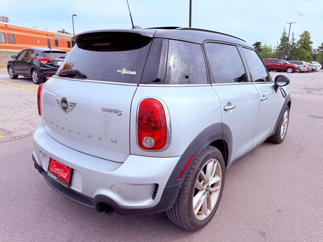 2013 MINI Cooper Cooper S 4dr All-wheel Drive ALL4 Sport Utility Photo