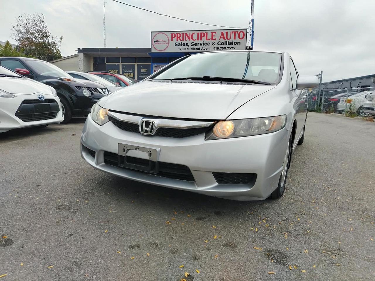 2010 Honda Civic DX Photo0