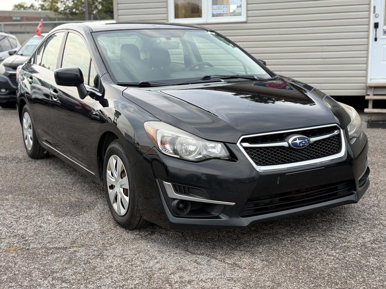 2016 Subaru Impreza 4DR SDN CVT 2.0I Photo