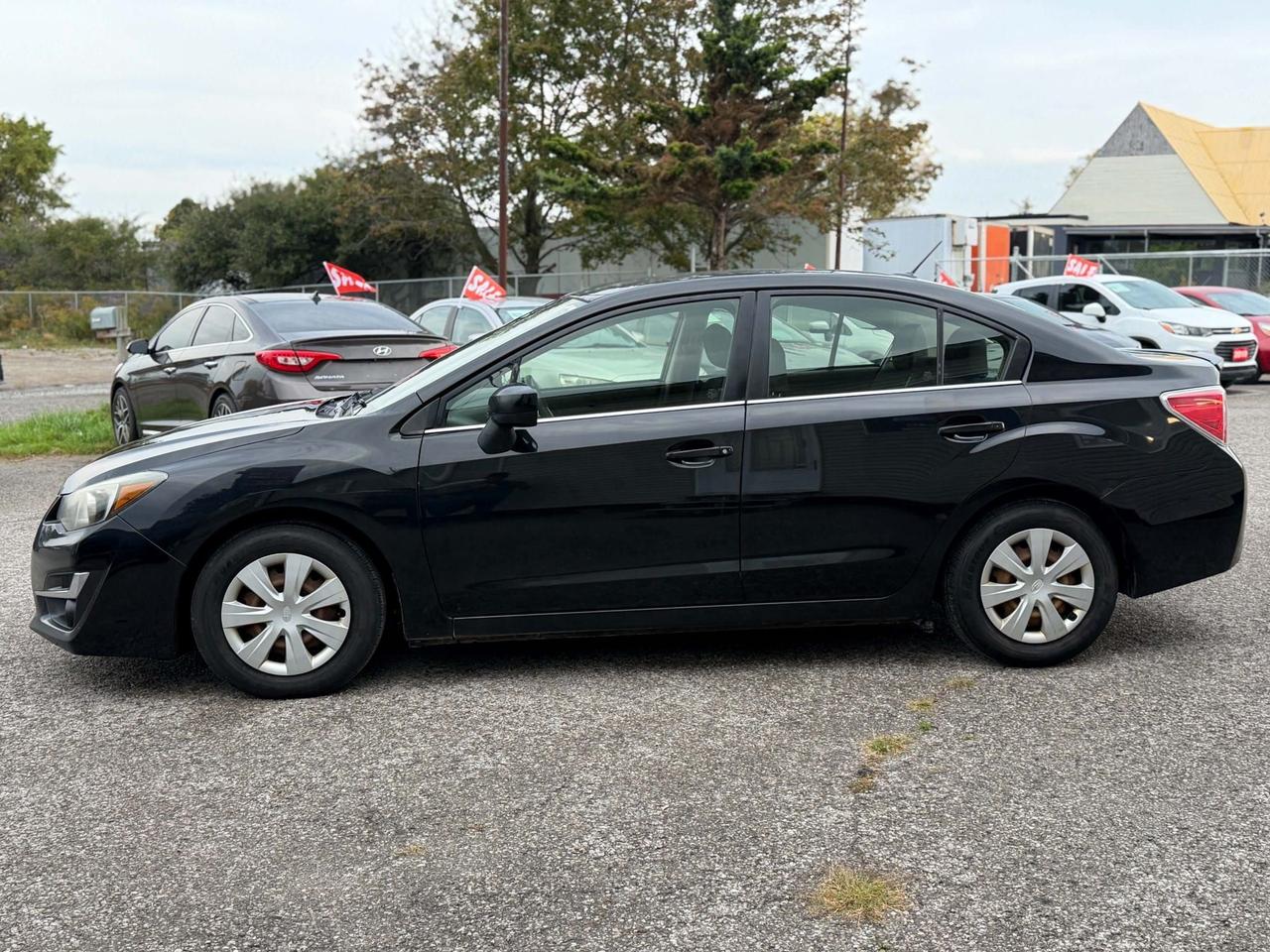 2016 Subaru Impreza 4DR SDN CVT 2.0I Photo