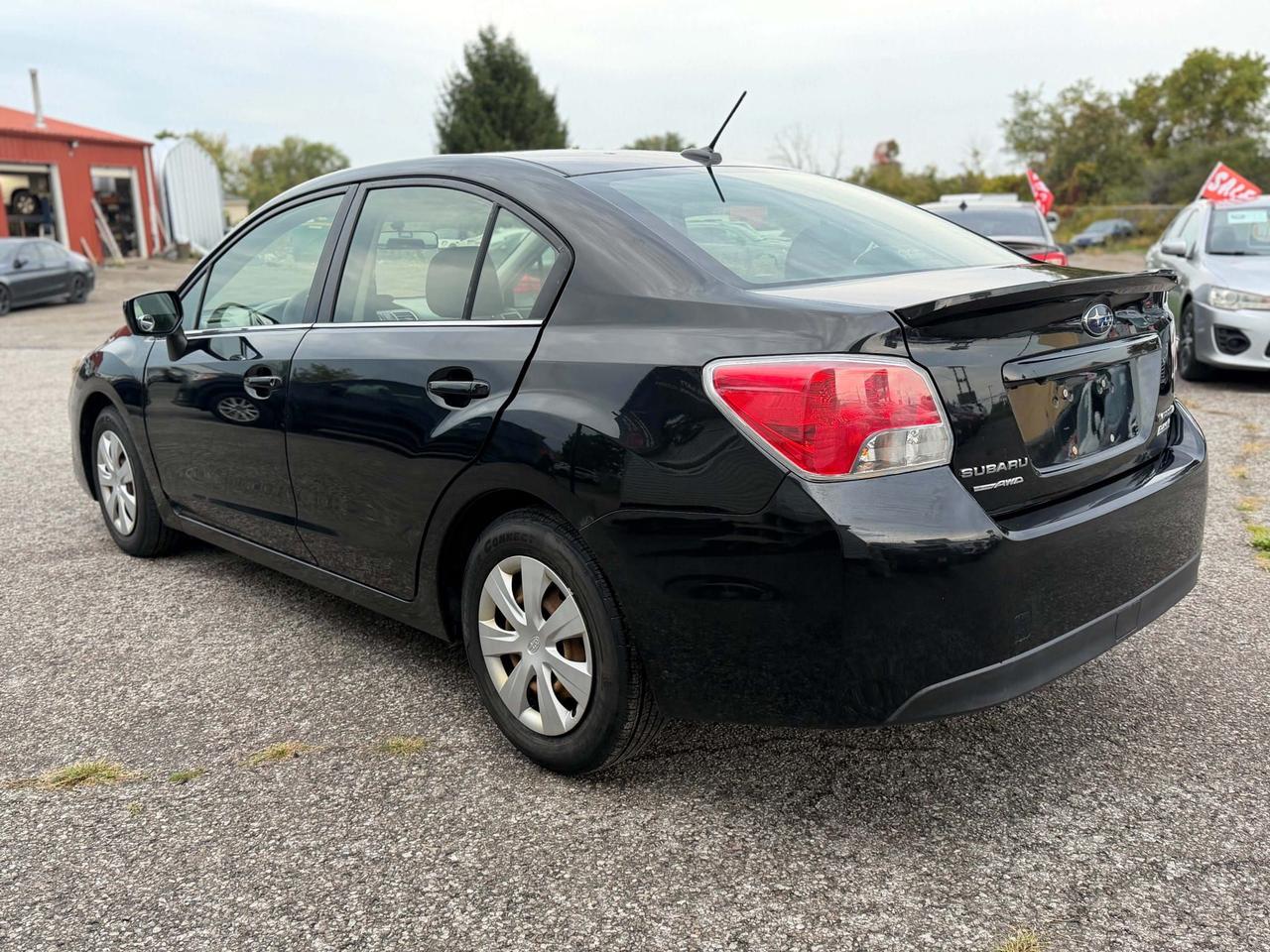 2016 Subaru Impreza 4DR SDN CVT 2.0I Photo