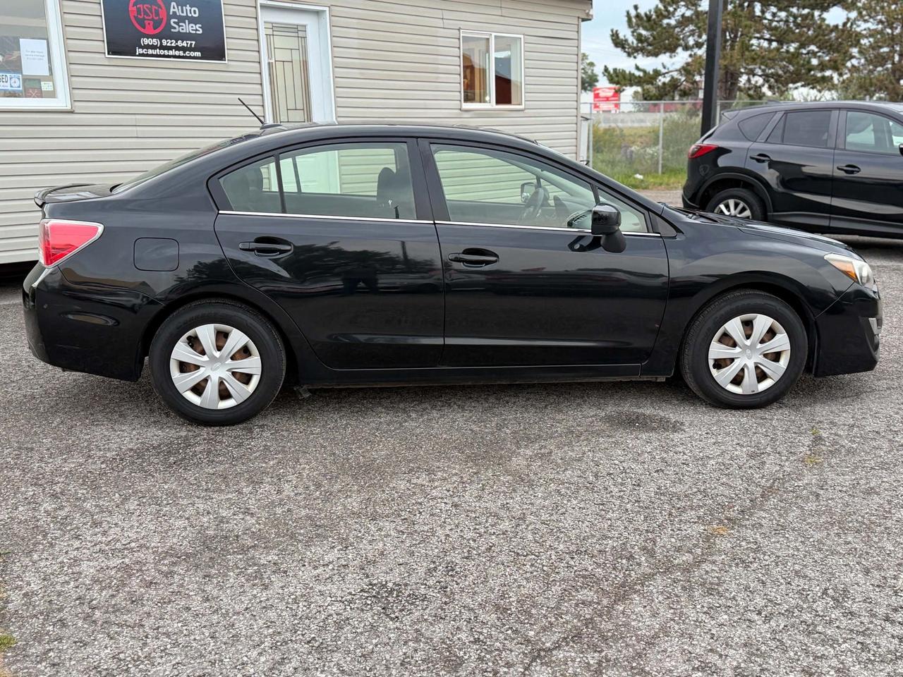 2016 Subaru Impreza 4DR SDN CVT 2.0I Photo