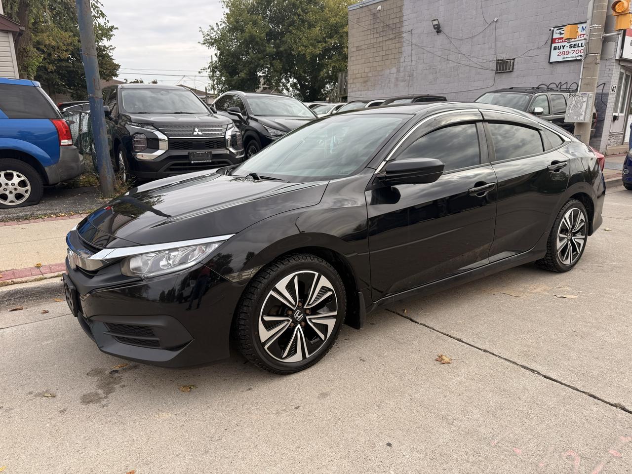 2017 Honda Civic 4dr Man LX Photo