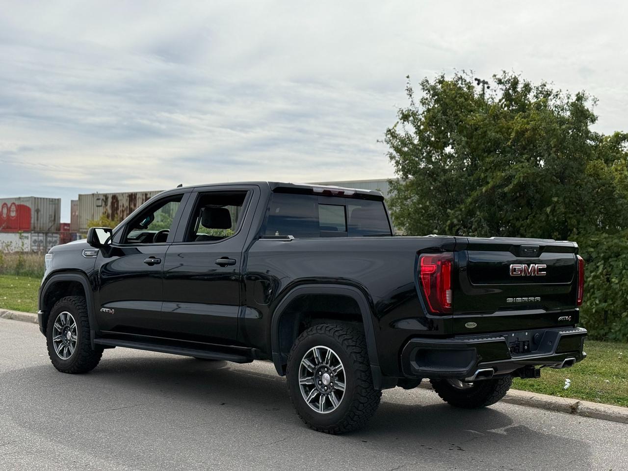 2024 GMC Sierra 1500 4WD Crew Cab 147" AT4 Photo5