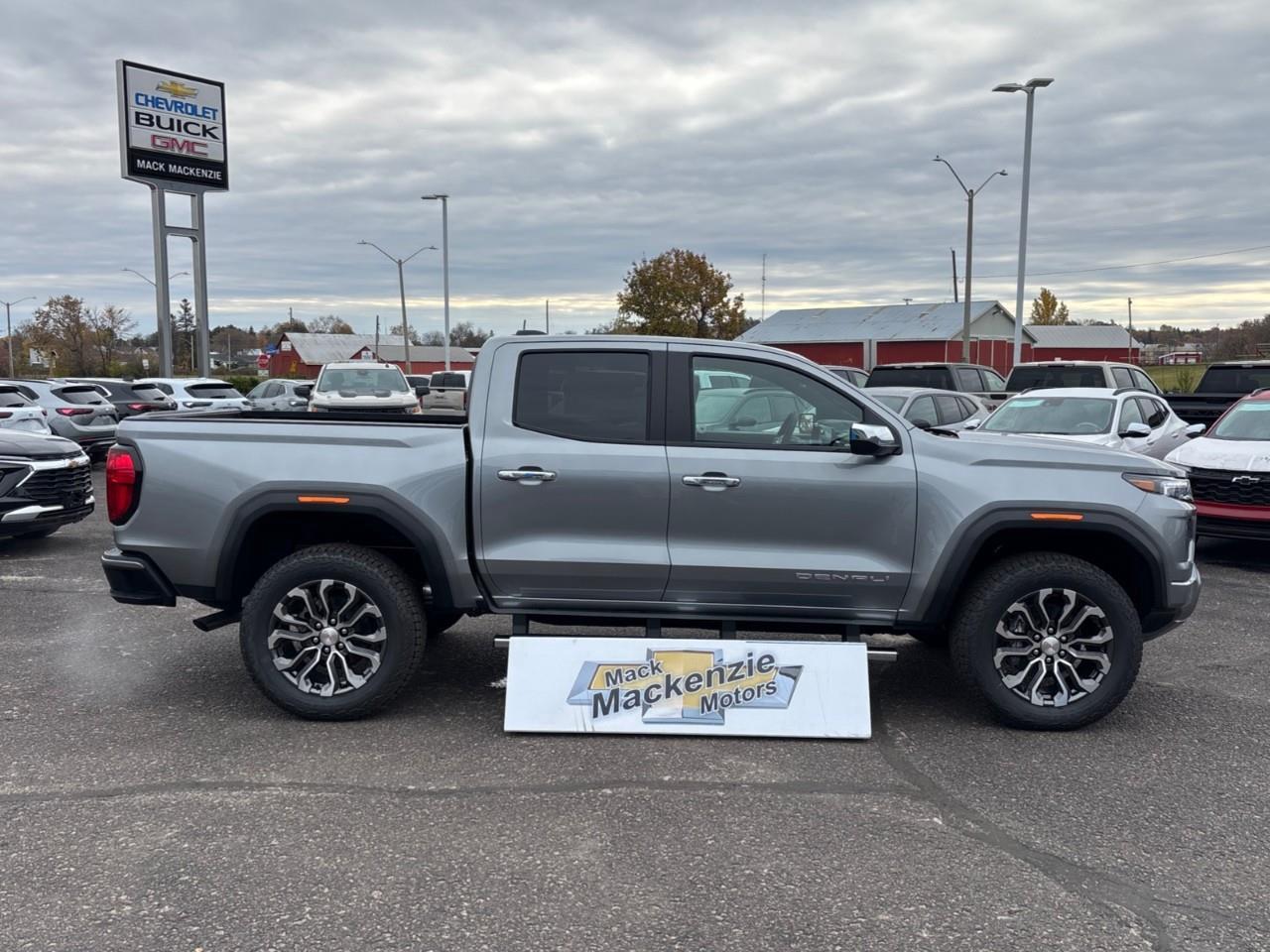 2026 GMC Canyon Denali New 5 Passenger Mid Size 4X4 Crew Cab Truck with Heated and Ventilated Front Seats, Power Front Seats, Heated Steering Wheel, Adaptive Cruise Control, Power Sunroof, Hard Folding Tonneau Cover and a 1 Photo