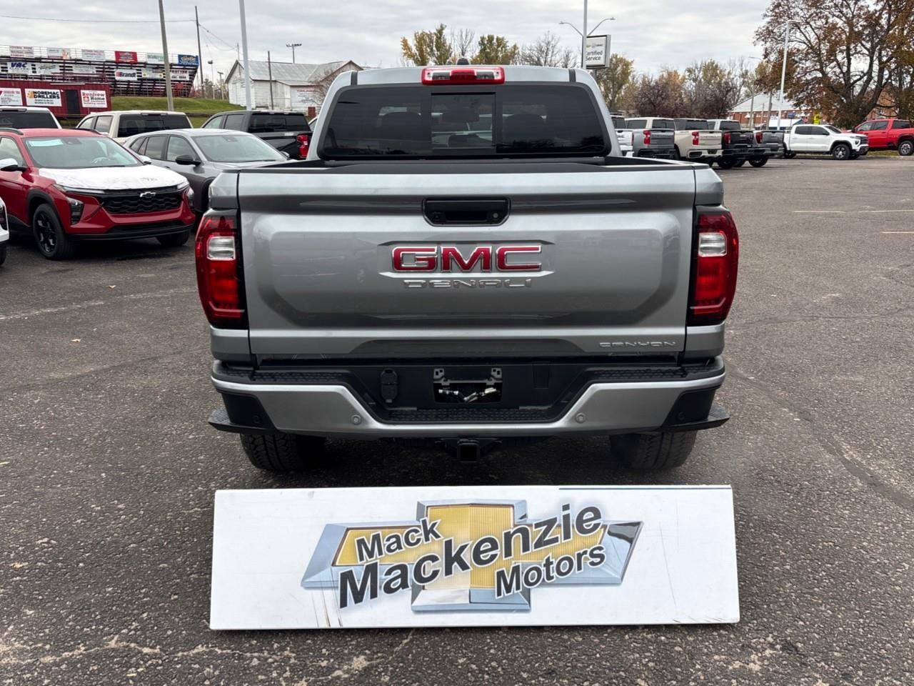 2026 GMC Canyon Denali New 5 Passenger Mid Size 4X4 Crew Cab Truck with Heated and Ventilated Front Seats, Power Front Seats, Heated Steering Wheel, Adaptive Cruise Control, Power Sunroof, Hard Folding Tonneau Cover and a 1 Photo