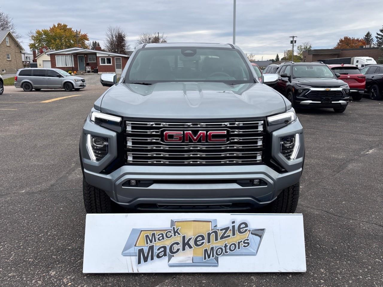 2026 GMC Canyon Denali New 5 Passenger Mid Size 4X4 Crew Cab Truck with Heated and Ventilated Front Seats, Power Front Seats, Heated Steering Wheel, Adaptive Cruise Control, Power Sunroof, Hard Folding Tonneau Cover and a 1 Photo