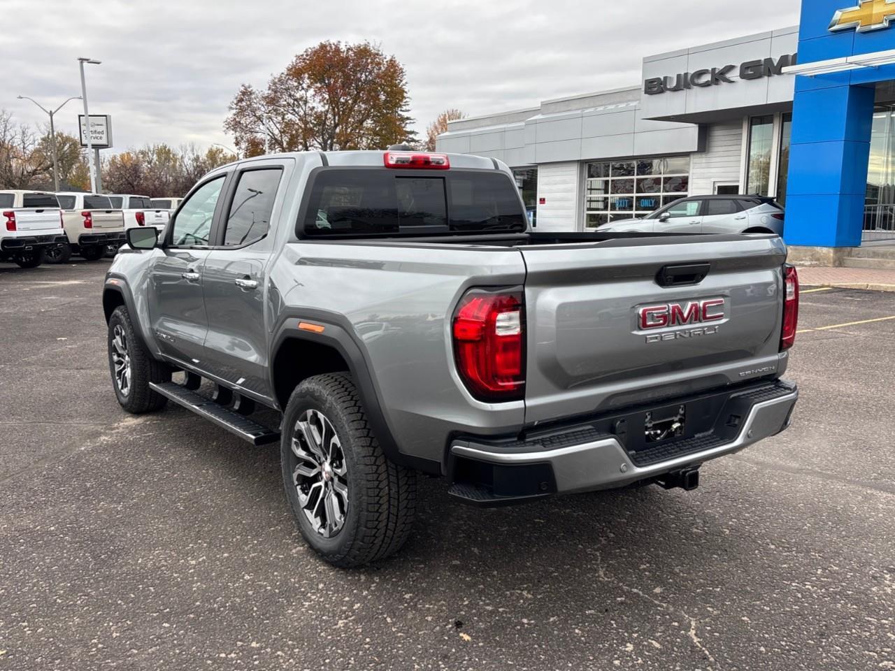 2026 GMC Canyon Denali New 5 Passenger Mid Size 4X4 Crew Cab Truck with Heated and Ventilated Front Seats, Power Front Seats, Heated Steering Wheel, Adaptive Cruise Control, Power Sunroof, Hard Folding Tonneau Cover and a 1 Photo