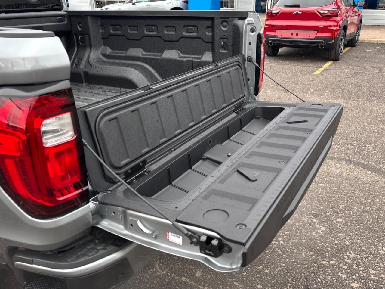 2026 GMC Canyon Denali New 5 Passenger Mid Size 4X4 Crew Cab Truck with Heated and Ventilated Front Seats, Power Front Seats, Heated Steering Wheel, Adaptive Cruise Control, Power Sunroof, Hard Folding Tonneau Cover and a 1 Photo