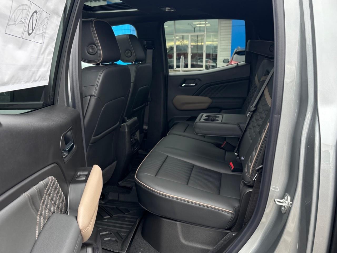 2026 GMC Canyon Denali New 5 Passenger Mid Size 4X4 Crew Cab Truck with Heated and Ventilated Front Seats, Power Front Seats, Heated Steering Wheel, Adaptive Cruise Control, Power Sunroof, Hard Folding Tonneau Cover and a 1 Photo