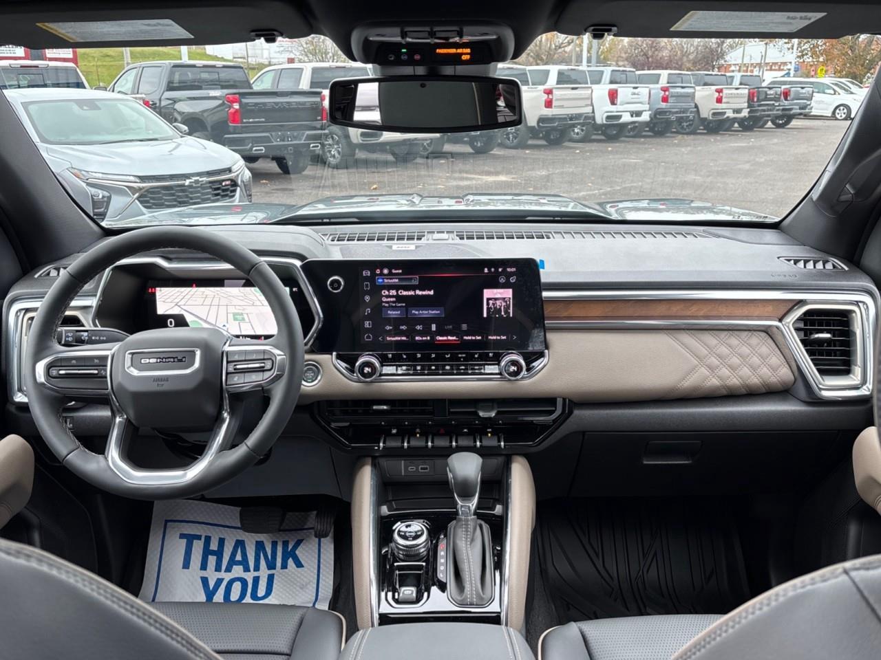 2026 GMC Canyon Denali New 5 Passenger Mid Size 4X4 Crew Cab Truck with Heated and Ventilated Front Seats, Power Front Seats, Heated Steering Wheel, Adaptive Cruise Control, Power Sunroof, Hard Folding Tonneau Cover and a 1 Photo