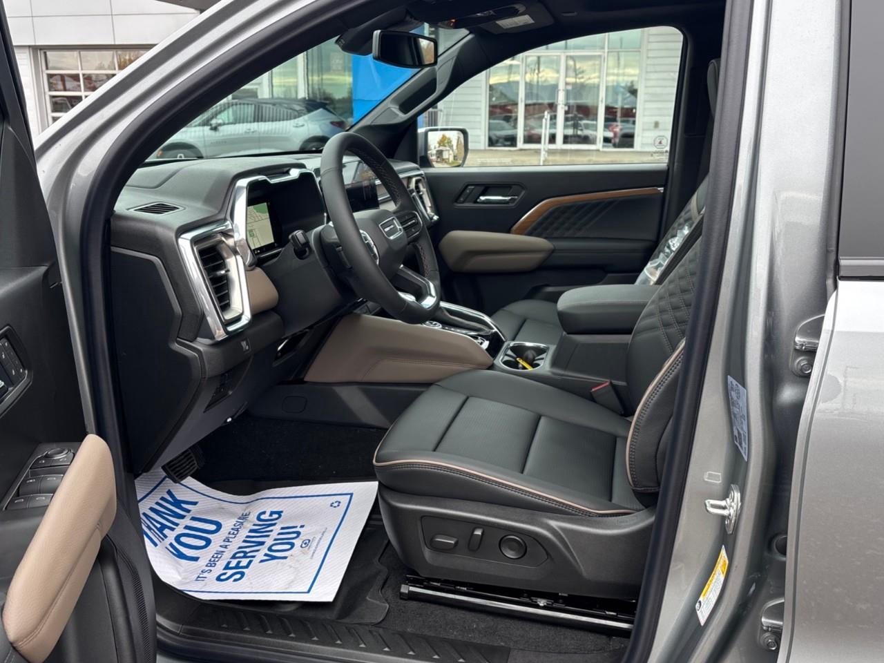 2026 GMC Canyon Denali New 5 Passenger Mid Size 4X4 Crew Cab Truck with Heated and Ventilated Front Seats, Power Front Seats, Heated Steering Wheel, Adaptive Cruise Control, Power Sunroof, Hard Folding Tonneau Cover and a 1 Photo