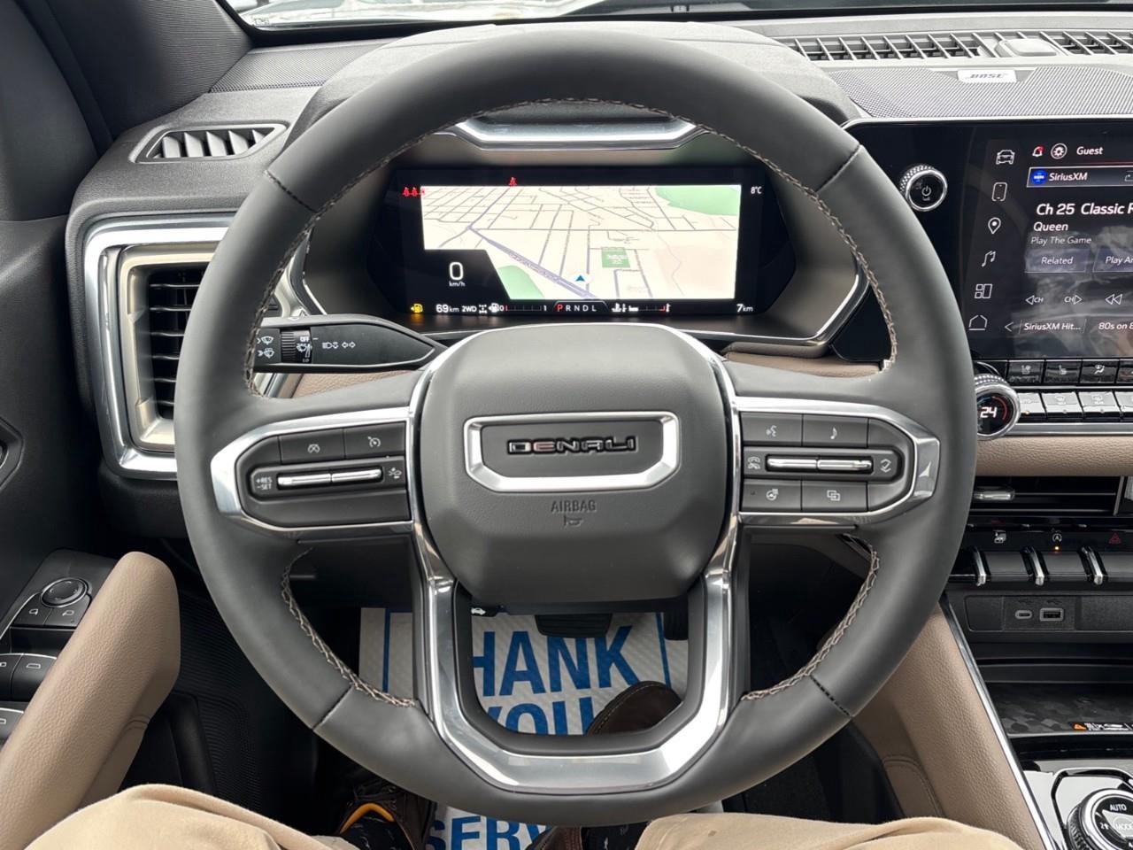 2026 GMC Canyon Denali New 5 Passenger Mid Size 4X4 Crew Cab Truck with Heated and Ventilated Front Seats, Power Front Seats, Heated Steering Wheel, Adaptive Cruise Control, Power Sunroof, Hard Folding Tonneau Cover and a 1 Photo