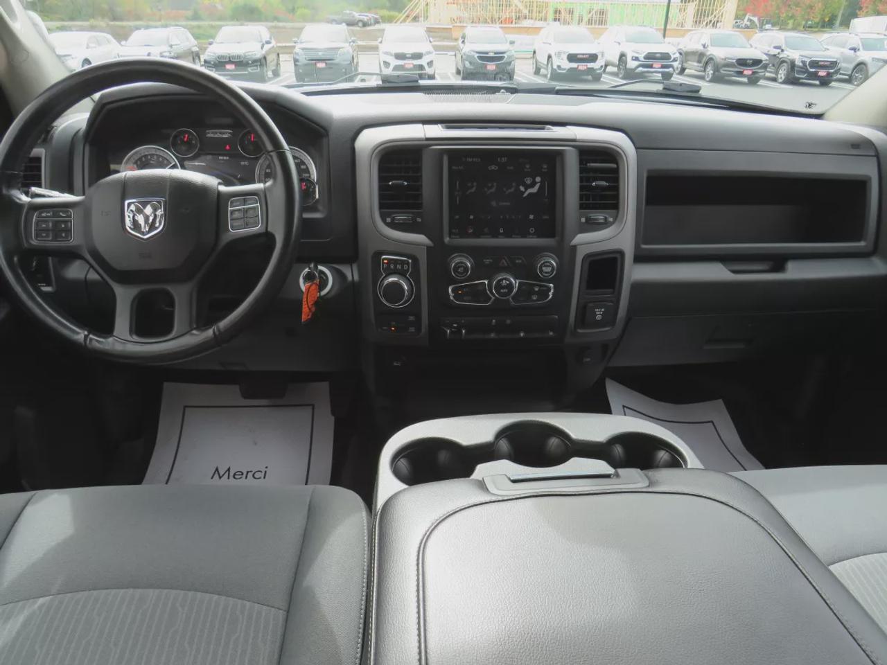 2021 RAM 1500 Classic Express | 4WD | Automatic | Crew Cab | Short Bed | Night Edition | Alloy Wheels | Heated Seats | Heated Steering Wheel | Power Driver Seat | Multi-Zone Climate Control | Android Auto & Apple CarPlay | Bluetooth | Back-Up Camera | Remote Start | Auto-Dimmi Photo