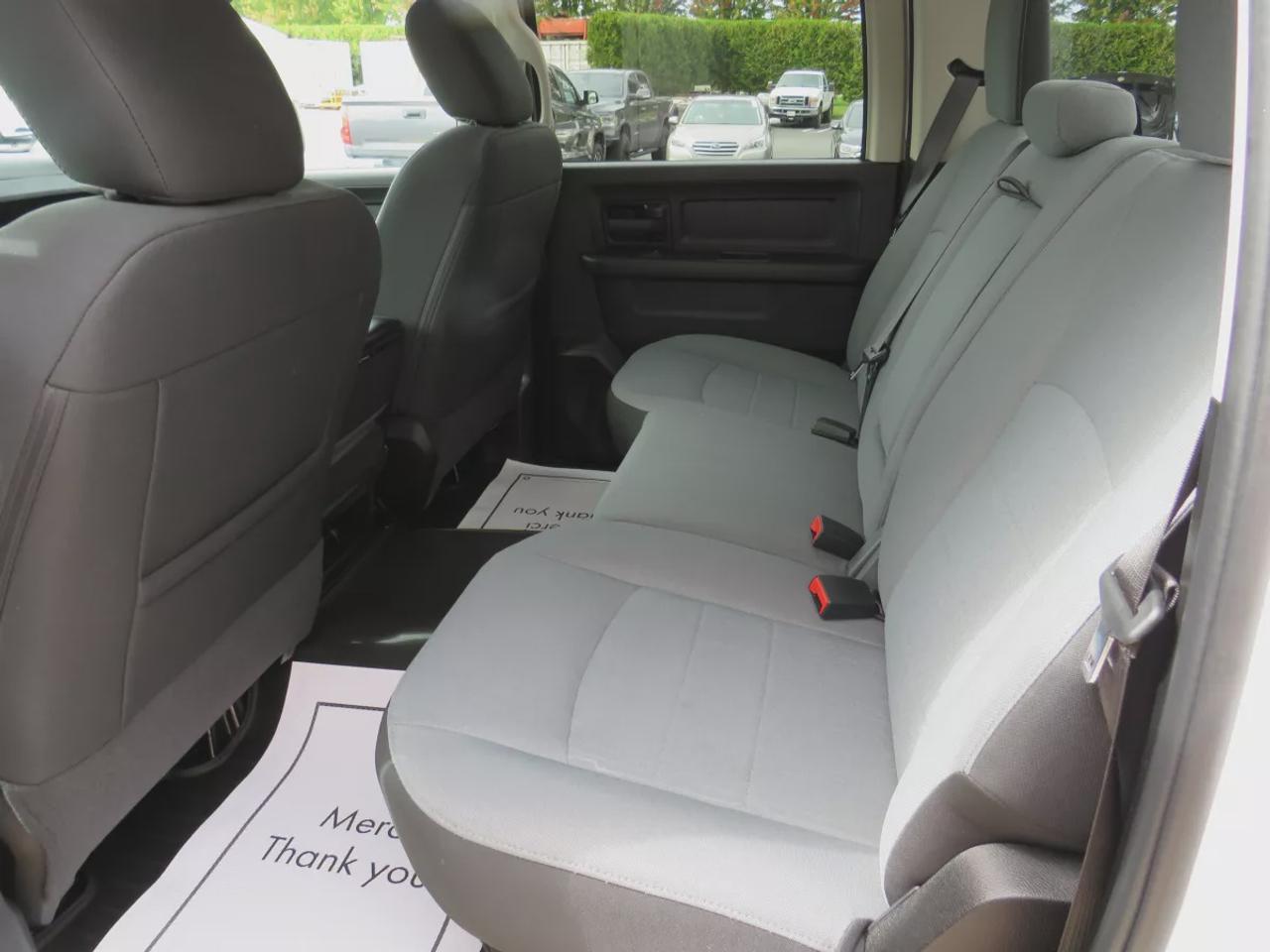 2021 RAM 1500 Classic Express | 4WD | Automatic | Crew Cab | Short Bed | Night Edition | Alloy Wheels | Heated Seats | Heated Steering Wheel | Power Driver Seat | Multi-Zone Climate Control | Android Auto & Apple CarPlay | Bluetooth | Back-Up Camera | Remote Start | Auto-Dimmi Photo