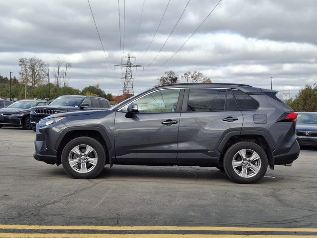 2023 Toyota RAV4 Hybrid LE AWD | Radar Cruise | Heated Seats | CarPlay + Android | Rear Camera | and More ! Photo