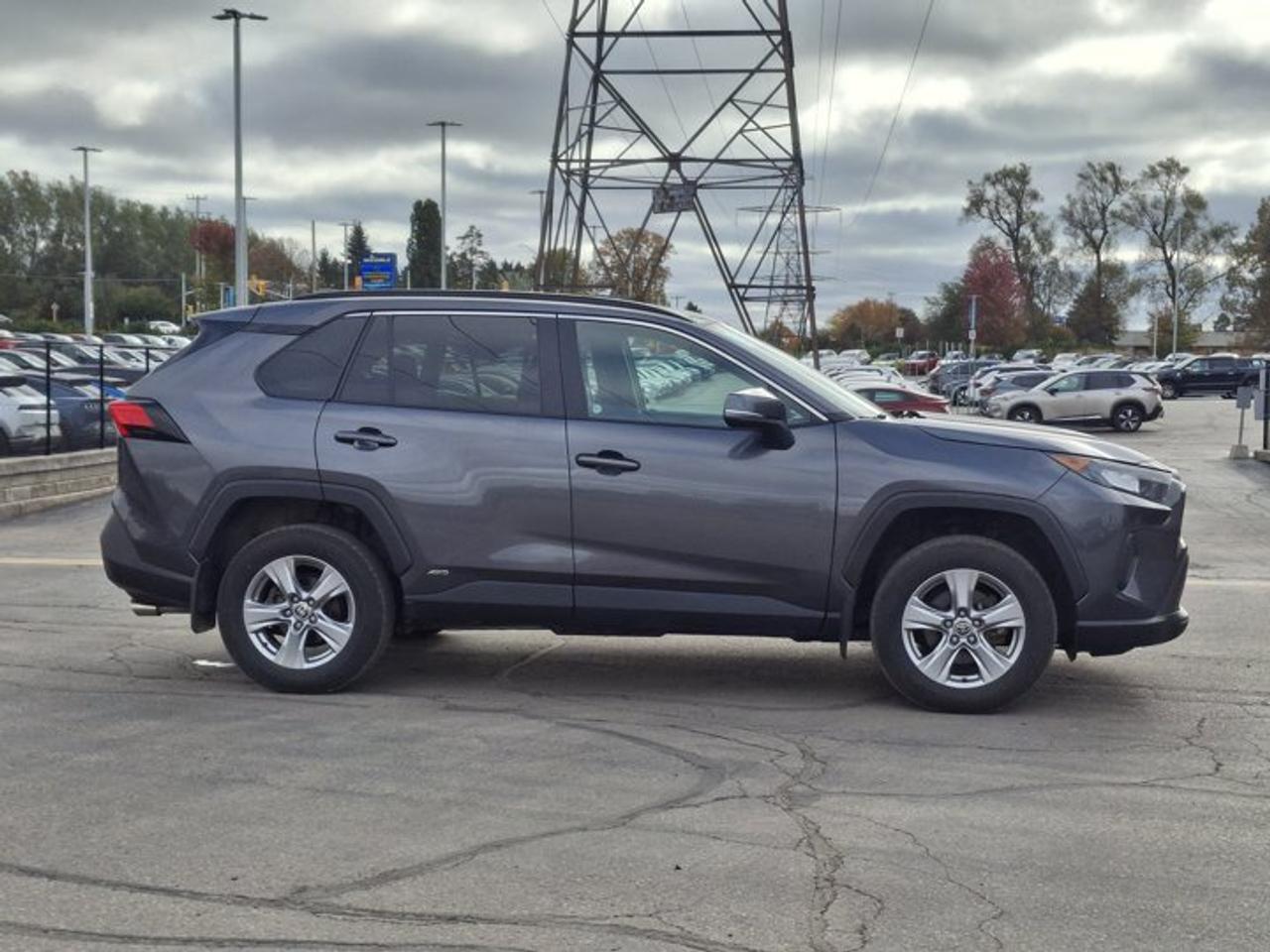 2023 Toyota RAV4 Hybrid LE AWD | Radar Cruise | Heated Seats | CarPlay + Android | Rear Camera | and More ! Photo
