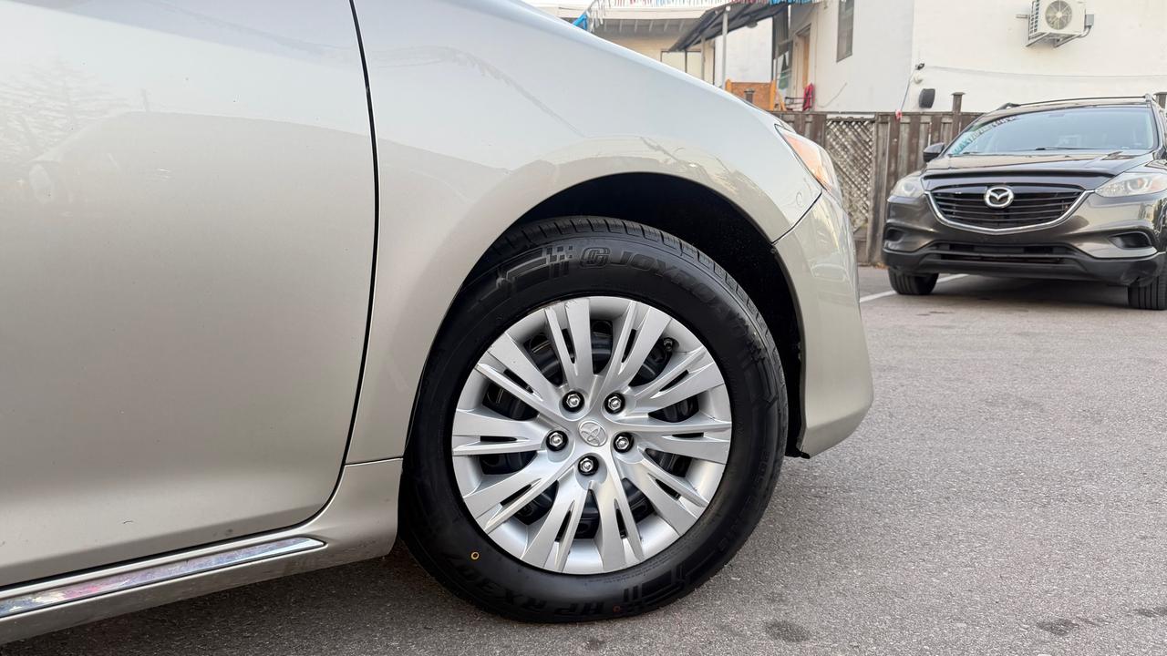 2014 Toyota Camry 4dr Sdn I4 Auto LE Photo