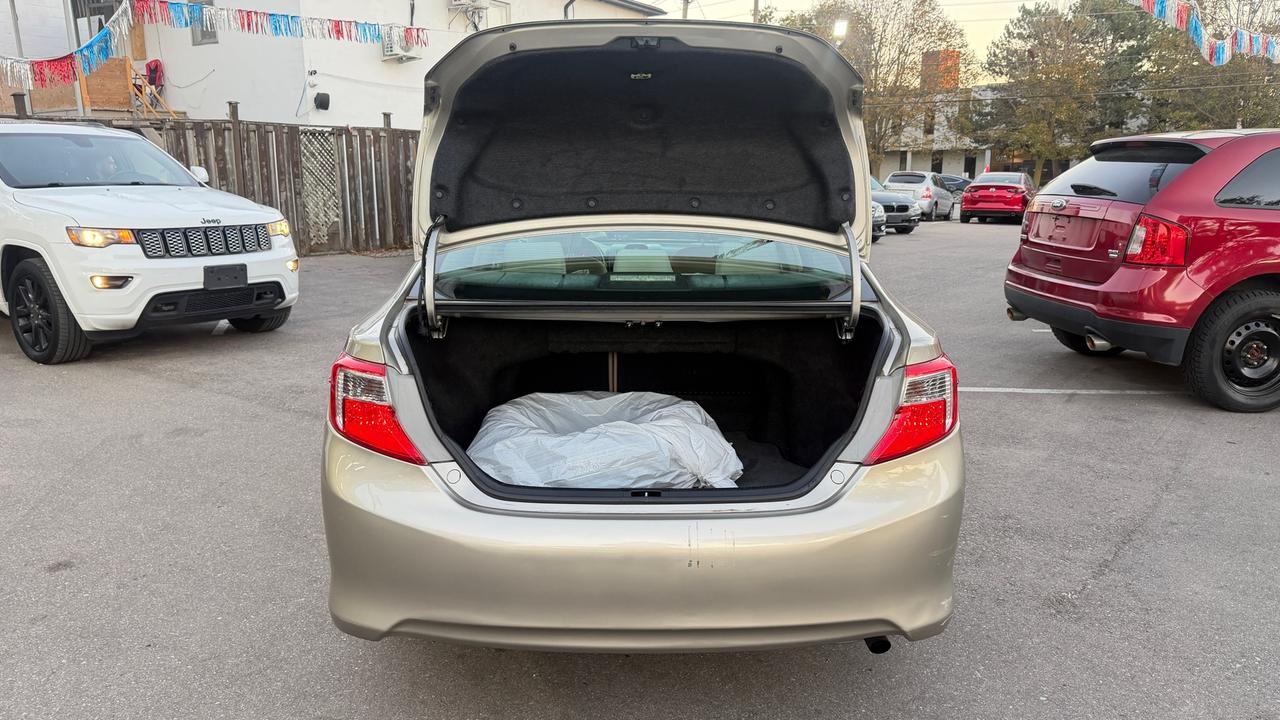 2014 Toyota Camry 4dr Sdn I4 Auto LE Photo