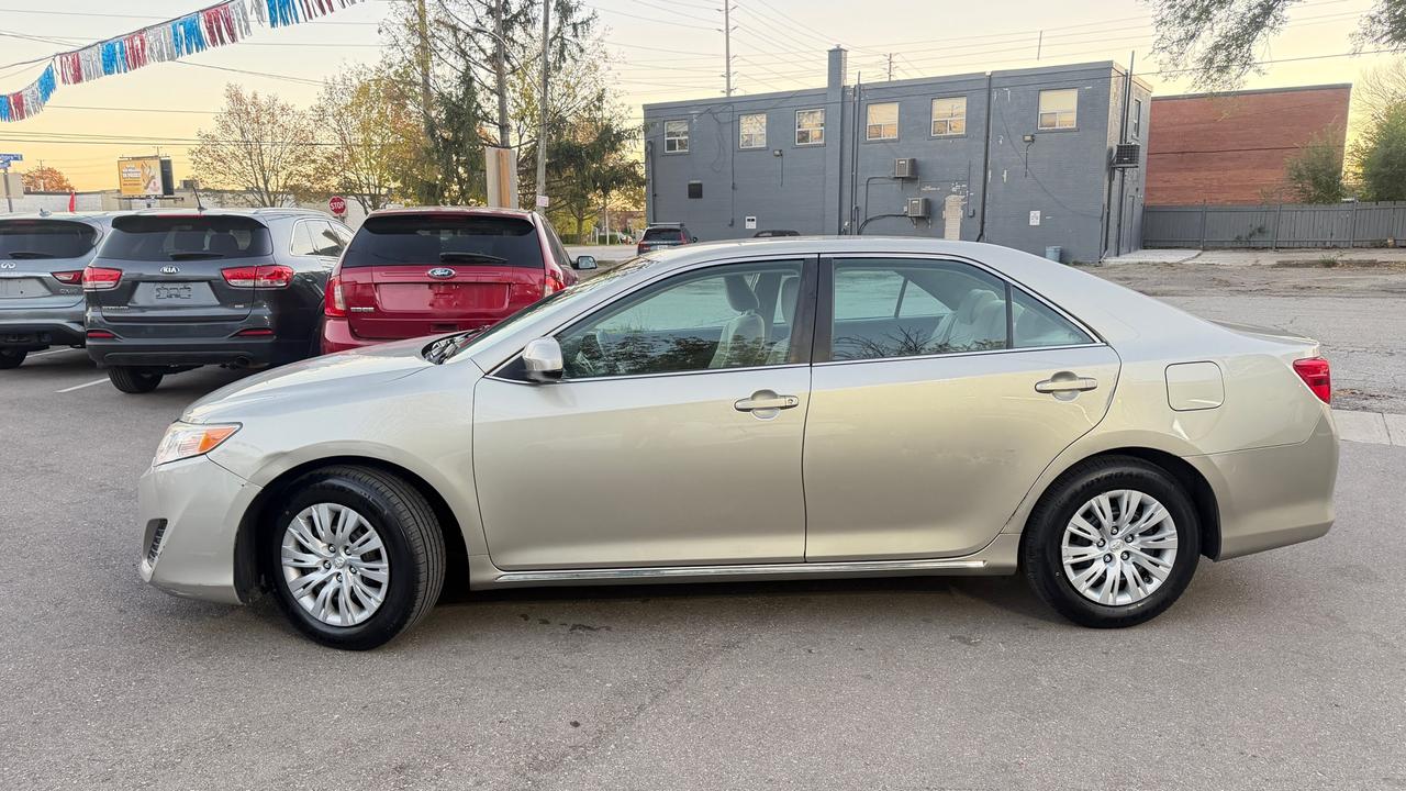 2014 Toyota Camry 4dr Sdn I4 Auto LE Photo