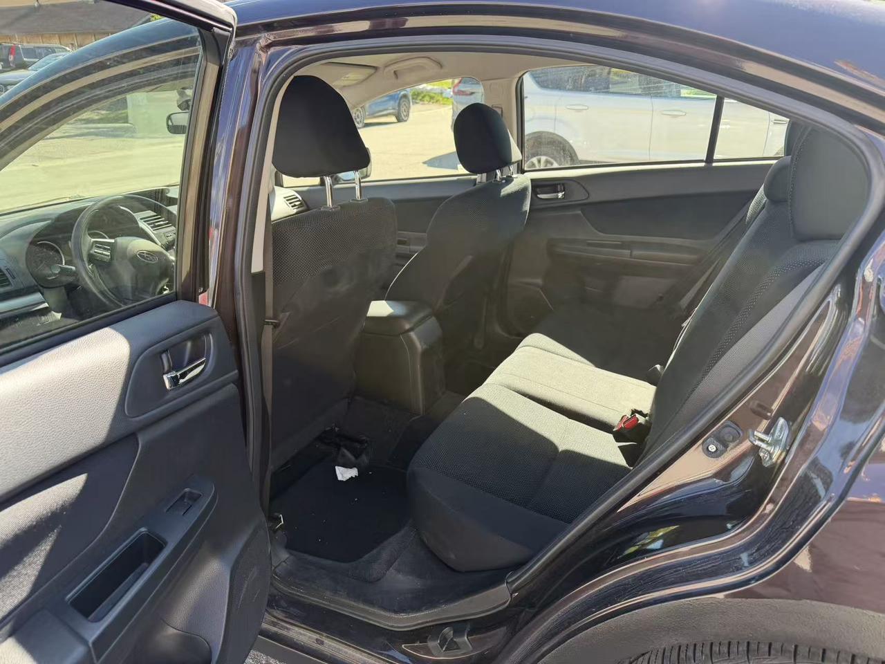 2013 Subaru Impreza 4dr Sdn CVT 2.0i w/Touring Pkg Photo