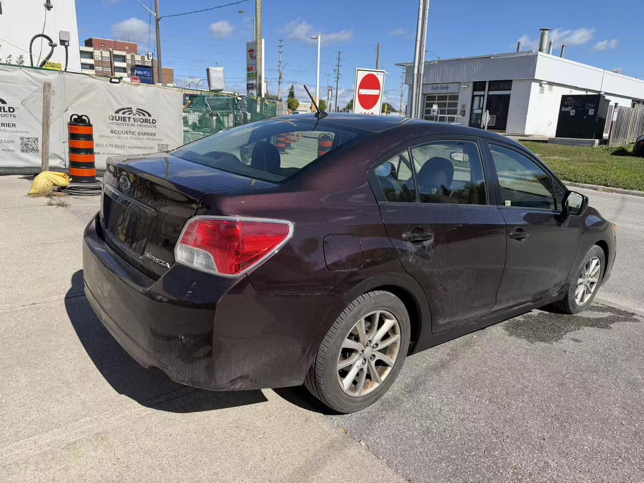 2013 Subaru Impreza 4dr Sdn CVT 2.0i w/Touring Pkg Photo
