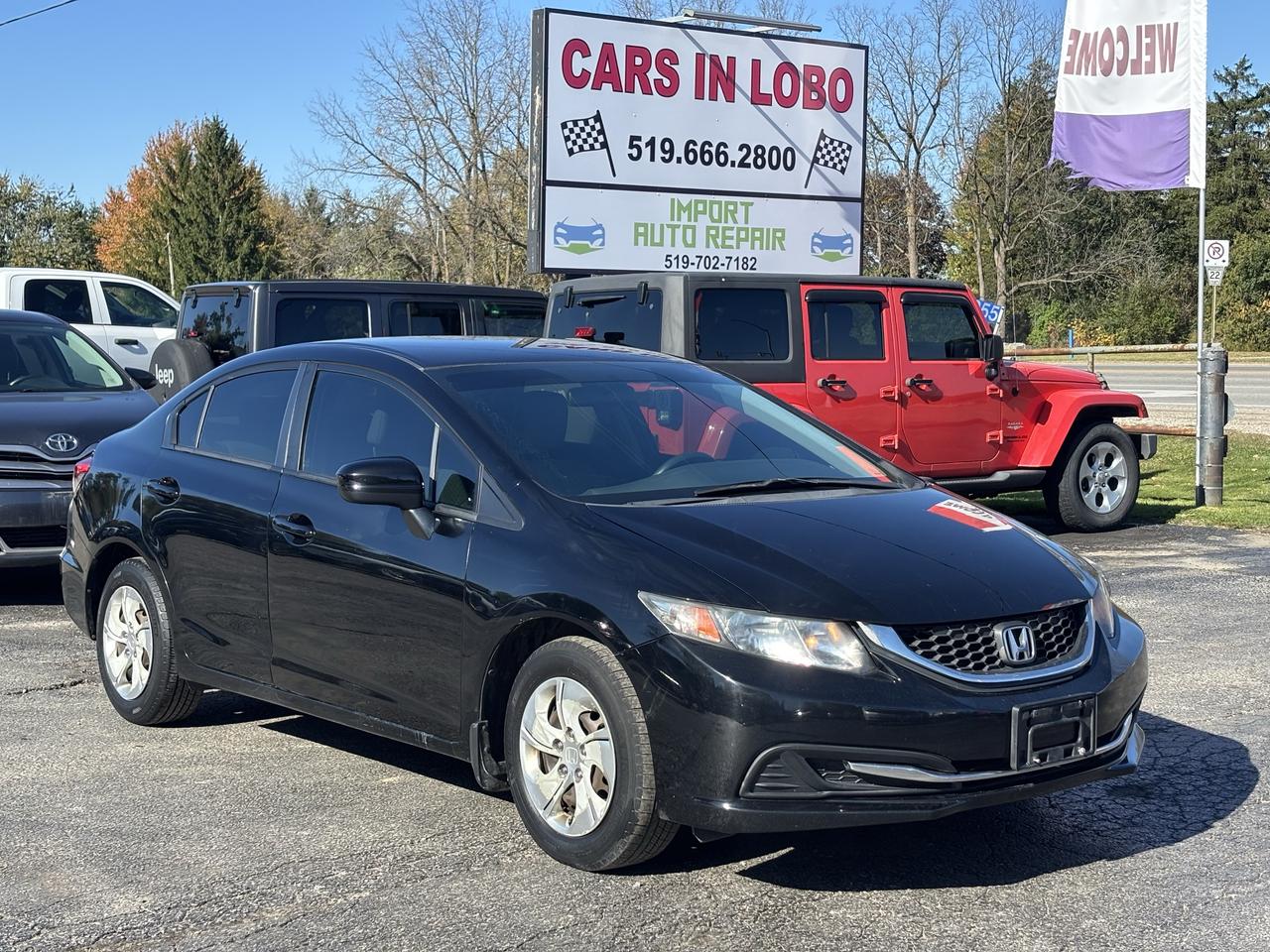 2015 Honda Civic 4dr Auto LX Photo0