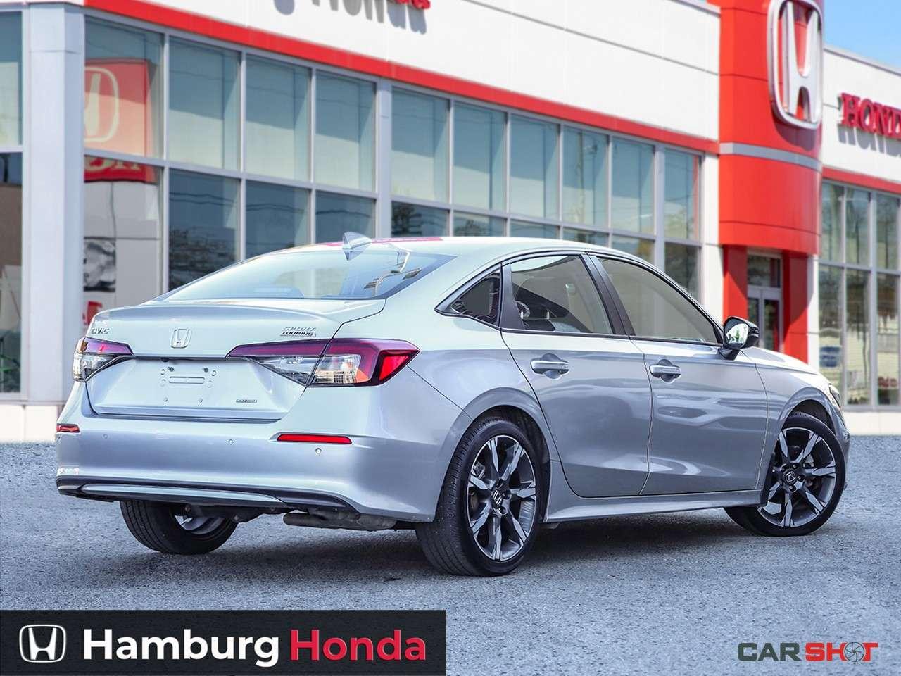 2025 Honda Civic Sport Touring eCVT Sedan Photo1