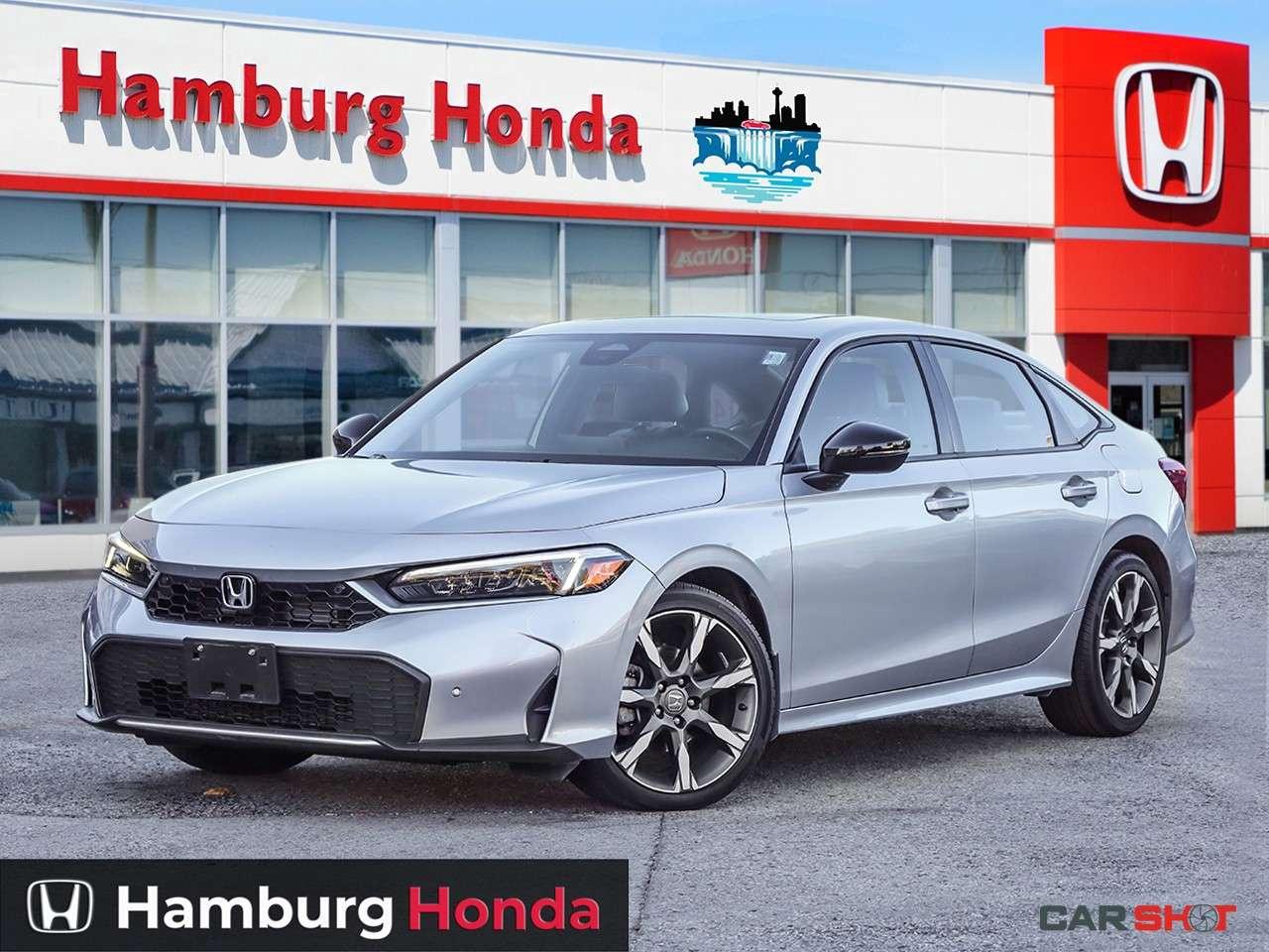2025 Honda Civic Sport Touring eCVT Sedan Photo0
