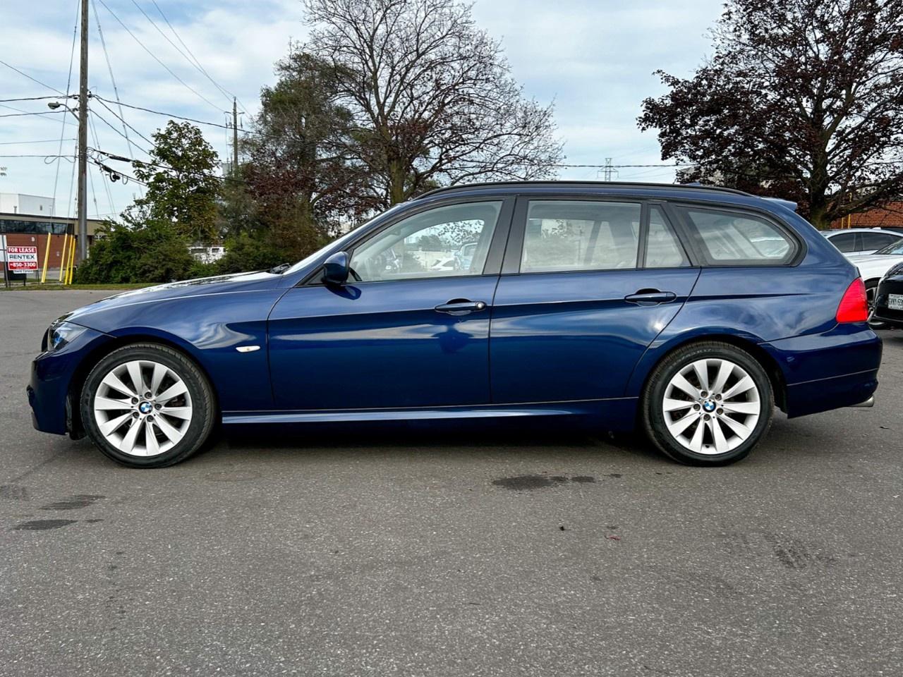 2011 BMW 3 Series 4dr Touring Wgn 328i xDrive AWD Exec Ed Photo