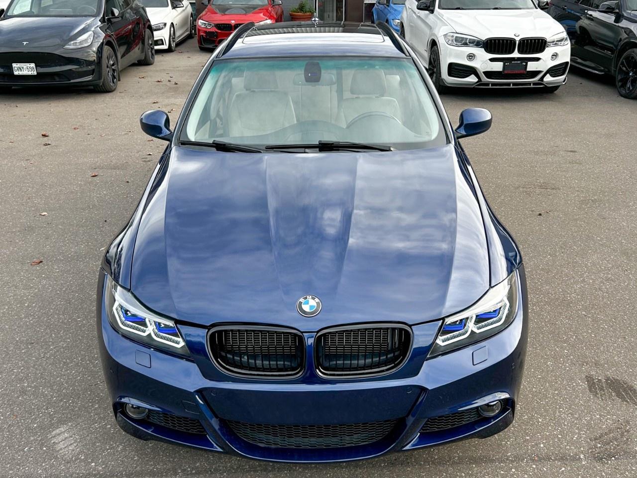 2011 BMW 3 Series 4dr Touring Wgn 328i xDrive AWD Exec Ed Photo