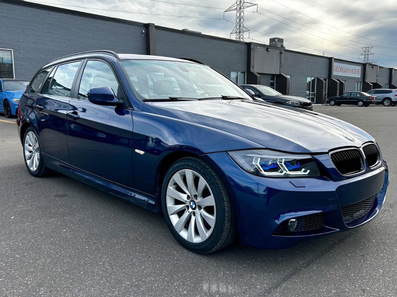 2011 BMW 3 Series 4dr Touring Wgn 328i xDrive AWD Exec Ed Photo