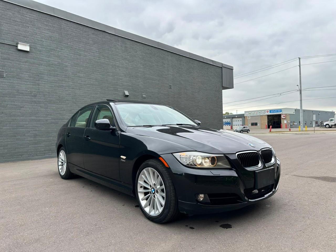 2011 BMW 3 Series 4dr Sdn 328i xDrive AWD Exec Ed Photo2