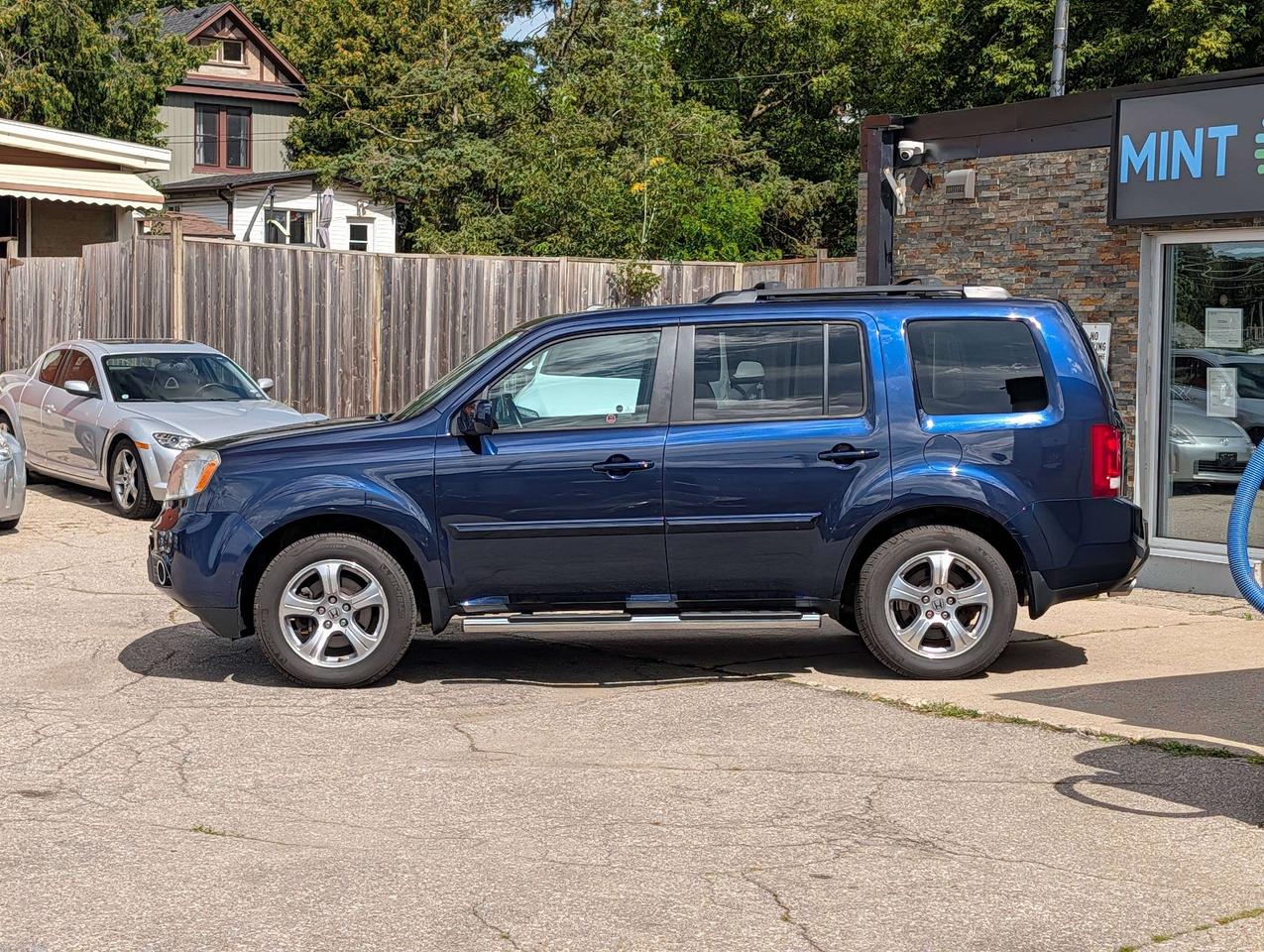 2014 Honda Pilot One Owner   27 Service Records   8 Passenger Photo