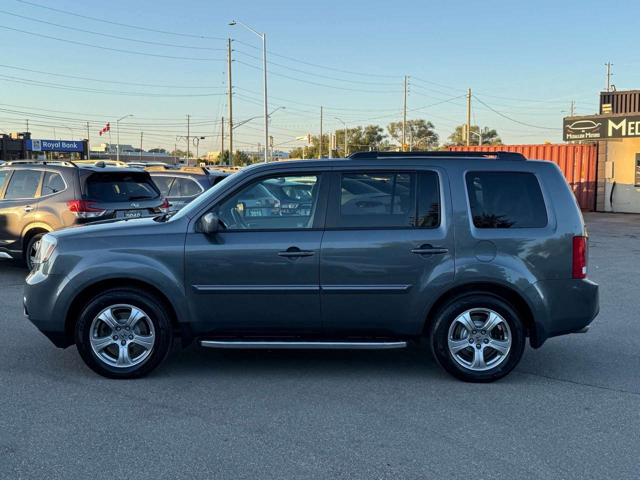 2012 Honda Pilot 4WD EX-L  ACCIDENT FREE 1-OWNER CERTIFIED Photo