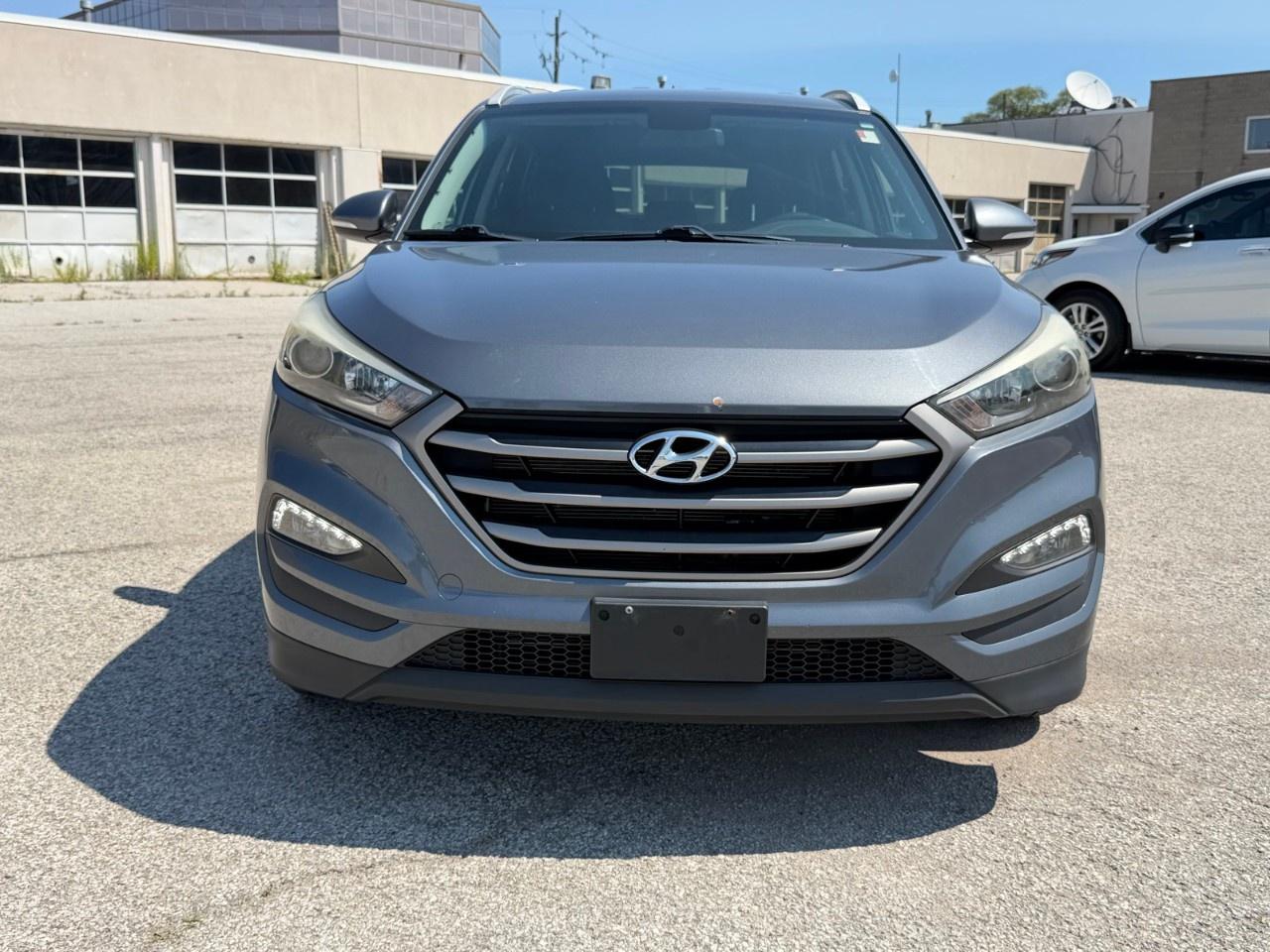 2016 Hyundai Tucson AWD 4DR 2.0L PREMIUM Photo1