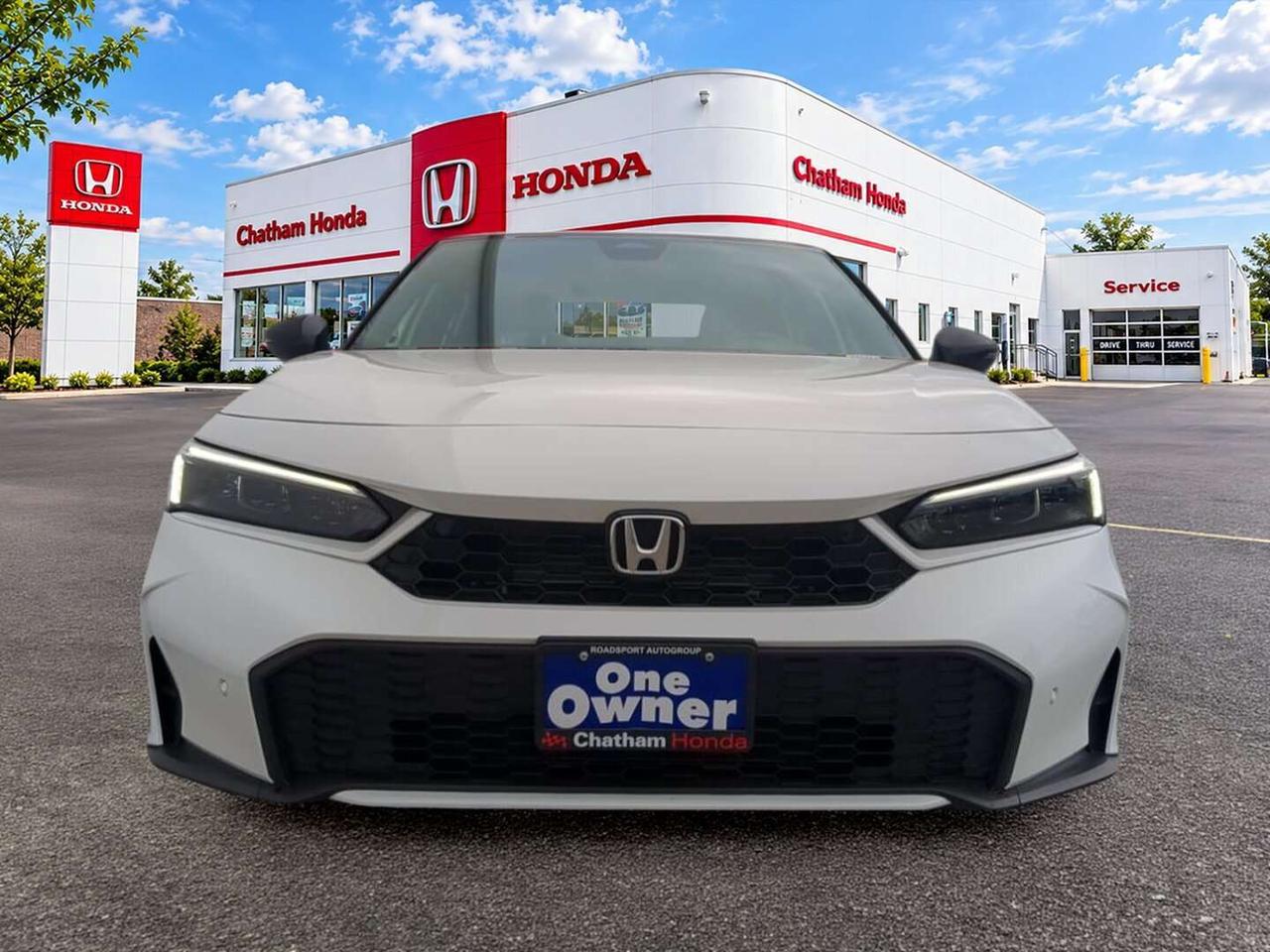 2025 Honda Civic Sport Touring eCVT Sedan 7 year/160,000km warranty Photo1