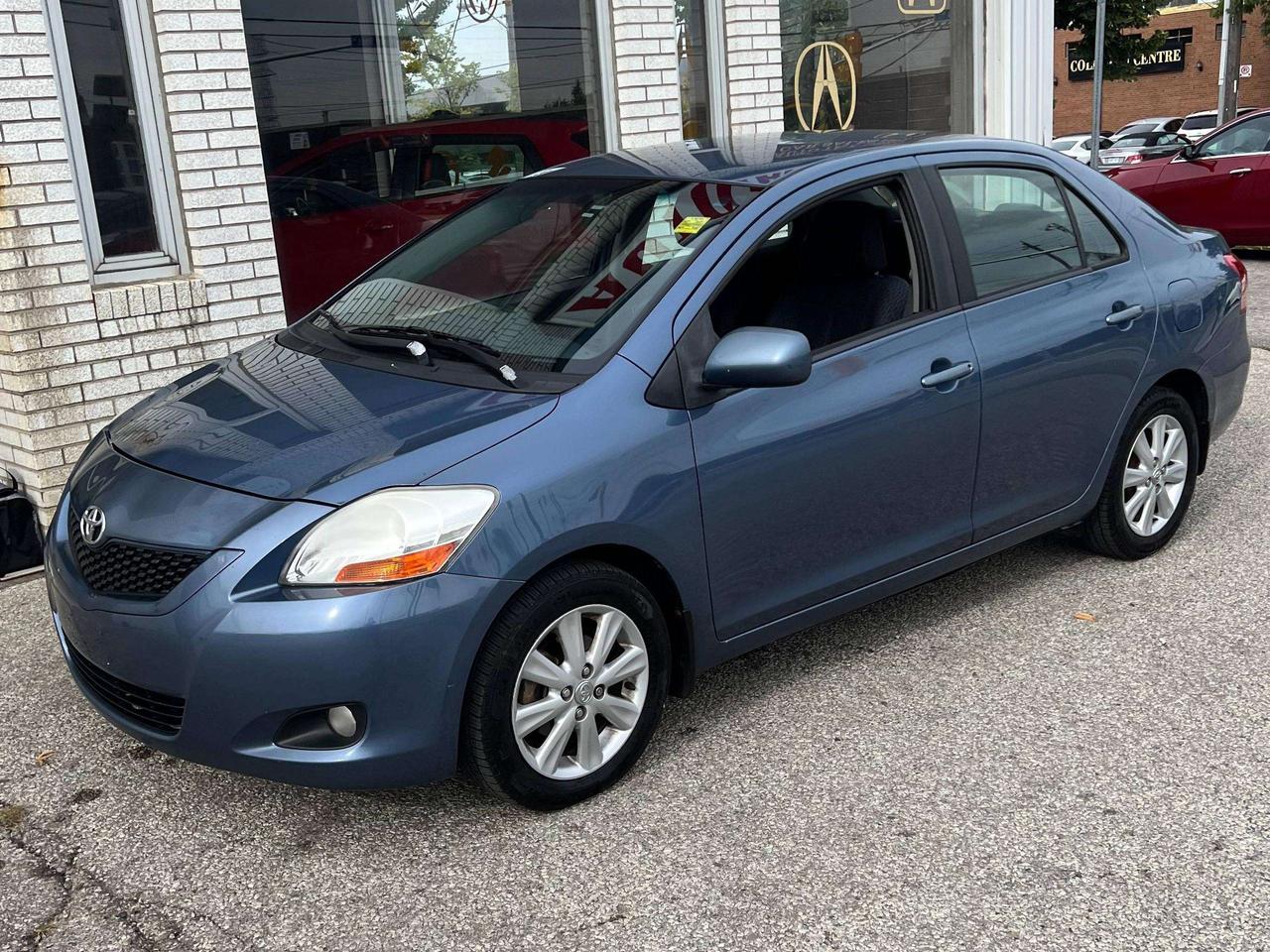 2009 Toyota Yaris 4DR SEDAN POWER WINDOWS AND LOCKS COLD AC Photo