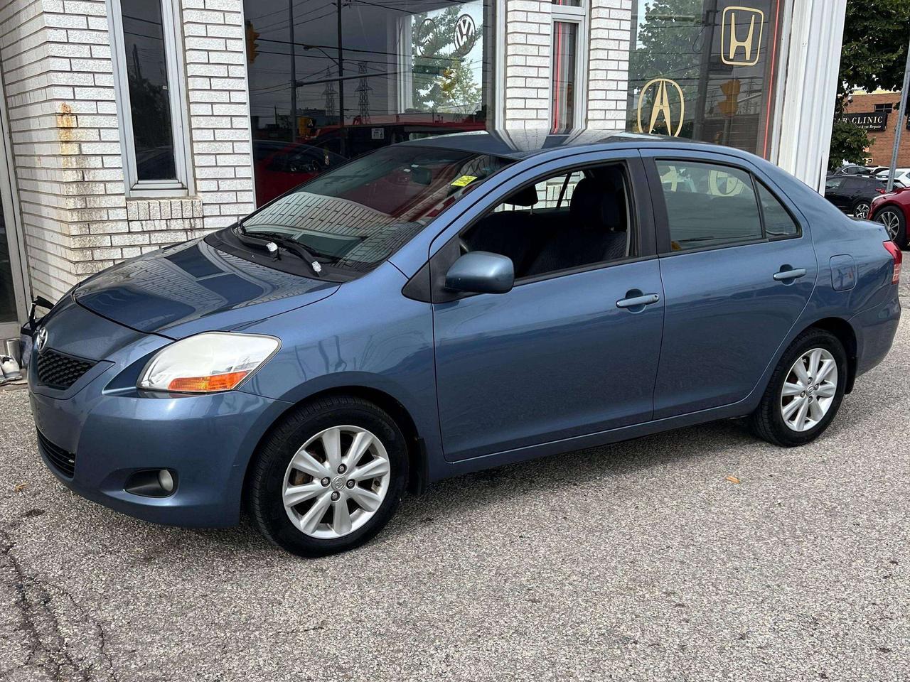 2009 Toyota Yaris 4DR SEDAN POWER WINDOWS AND LOCKS COLD AC Photo0