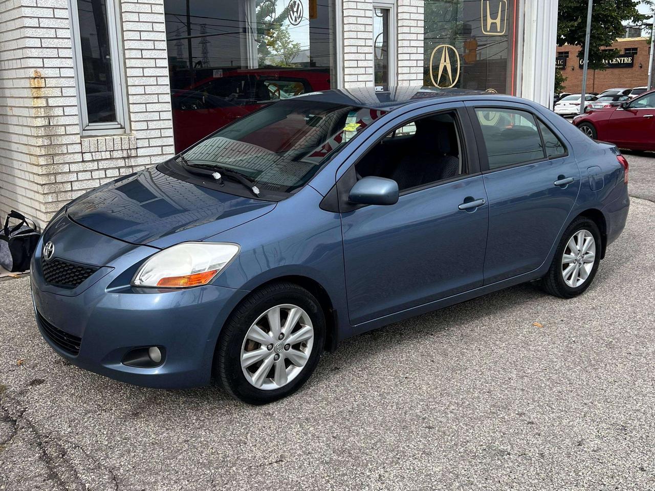 2009 Toyota Yaris 4DR SEDAN POWER WINDOWS AND LOCKS COLD AC Photo1