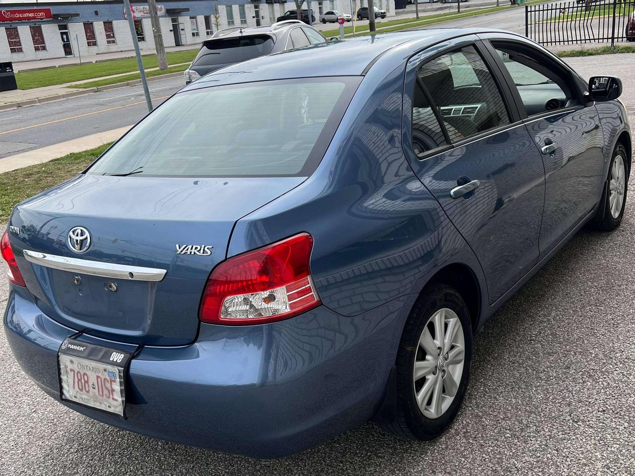 2009 Toyota Yaris 4DR SEDAN POWER WINDOWS AND LOCKS COLD AC Photo