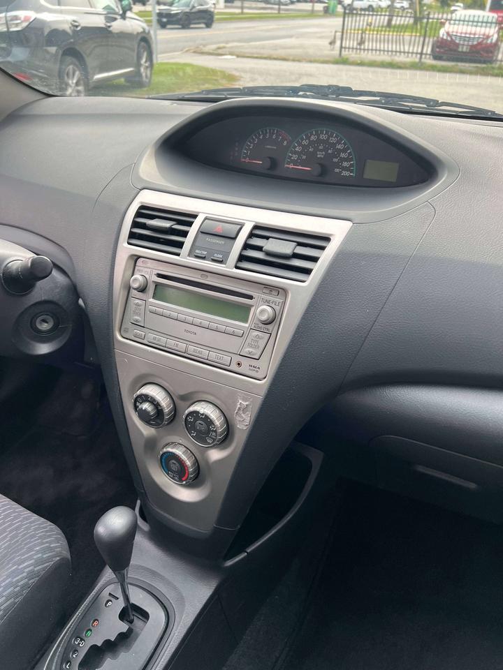 2009 Toyota Yaris 4DR SEDAN POWER WINDOWS AND LOCKS COLD AC Photo