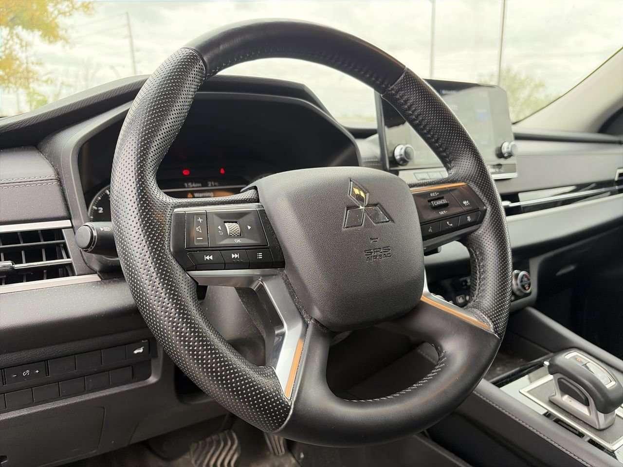 2024 Mitsubishi Outlander SE S-AWC FINANCED PRICE ADVERTISED   PANO SUNROOF   SUEDE/LEATHER SEATS   2 SET TIRES   HEAT STEER Photo