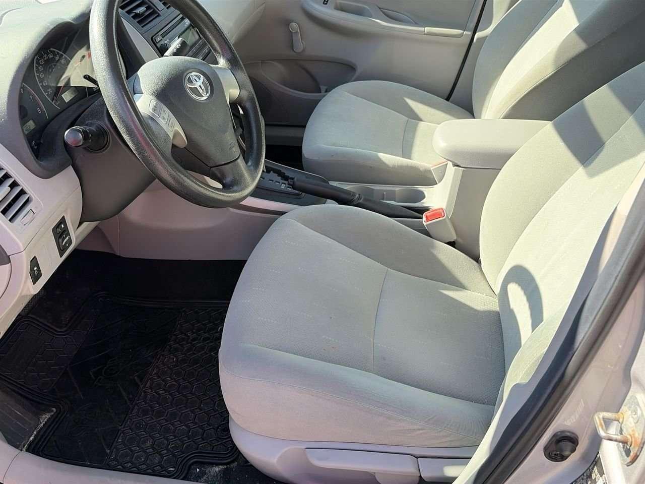 2012 Toyota Corolla 4-door Sedan LE 4A FWD   CLOTH   CD PLAYER   BLUETOOTH CONNECT Photo