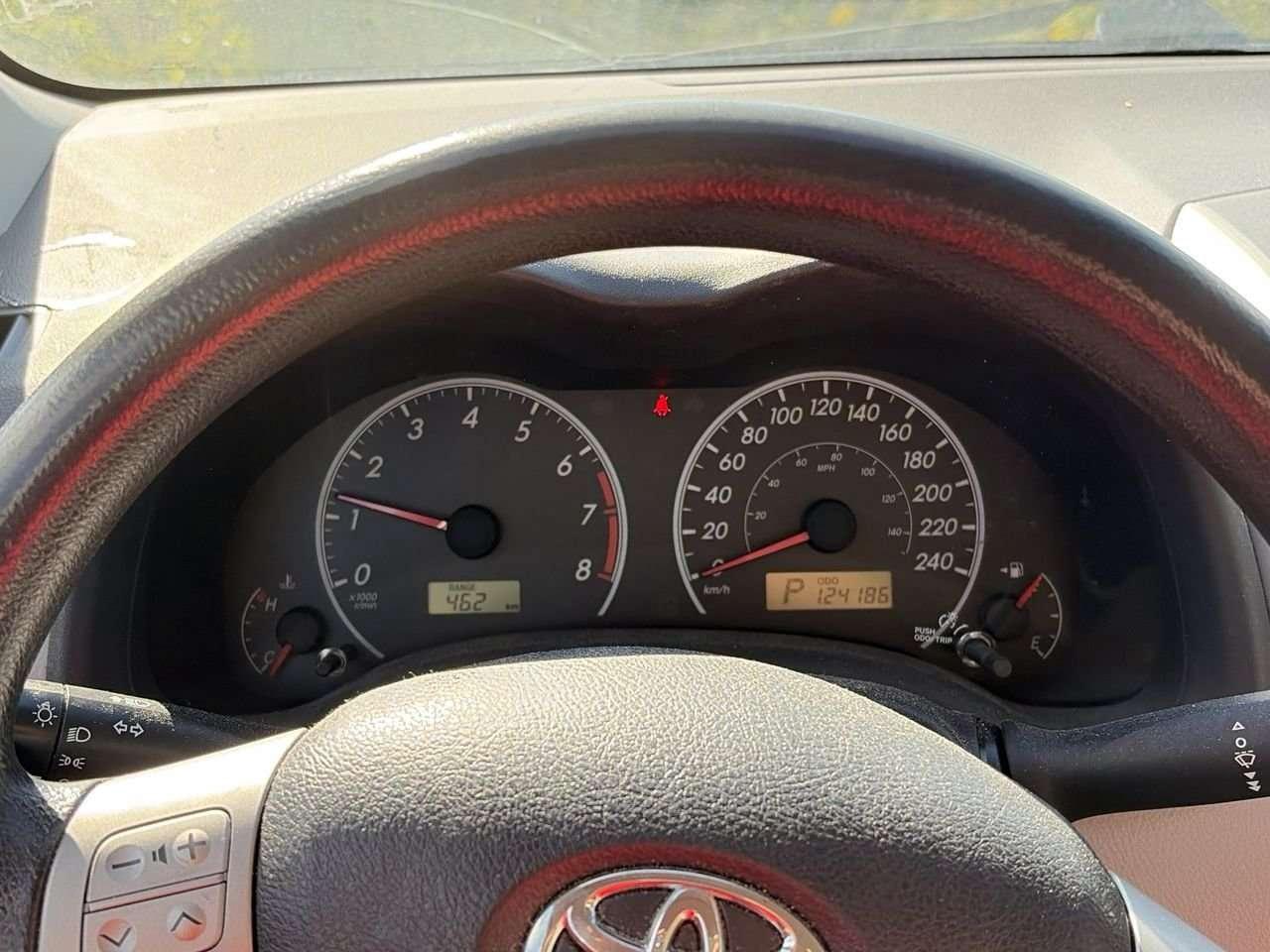 2012 Toyota Corolla 4-door Sedan LE 4A FWD   CLOTH   CD PLAYER   BLUETOOTH CONNECT Photo