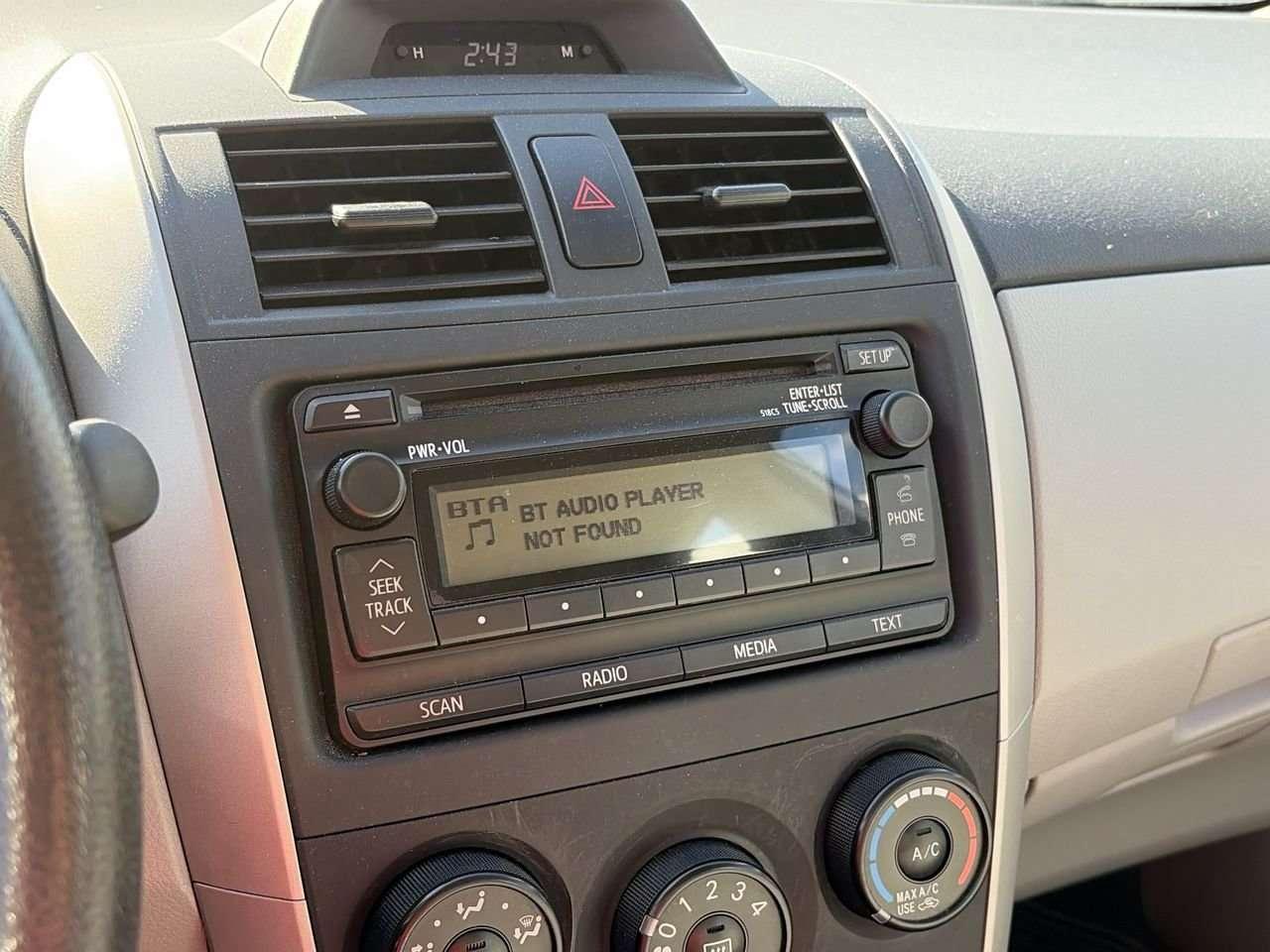 2012 Toyota Corolla 4-door Sedan LE 4A FWD   CLOTH   CD PLAYER   BLUETOOTH CONNECT Photo