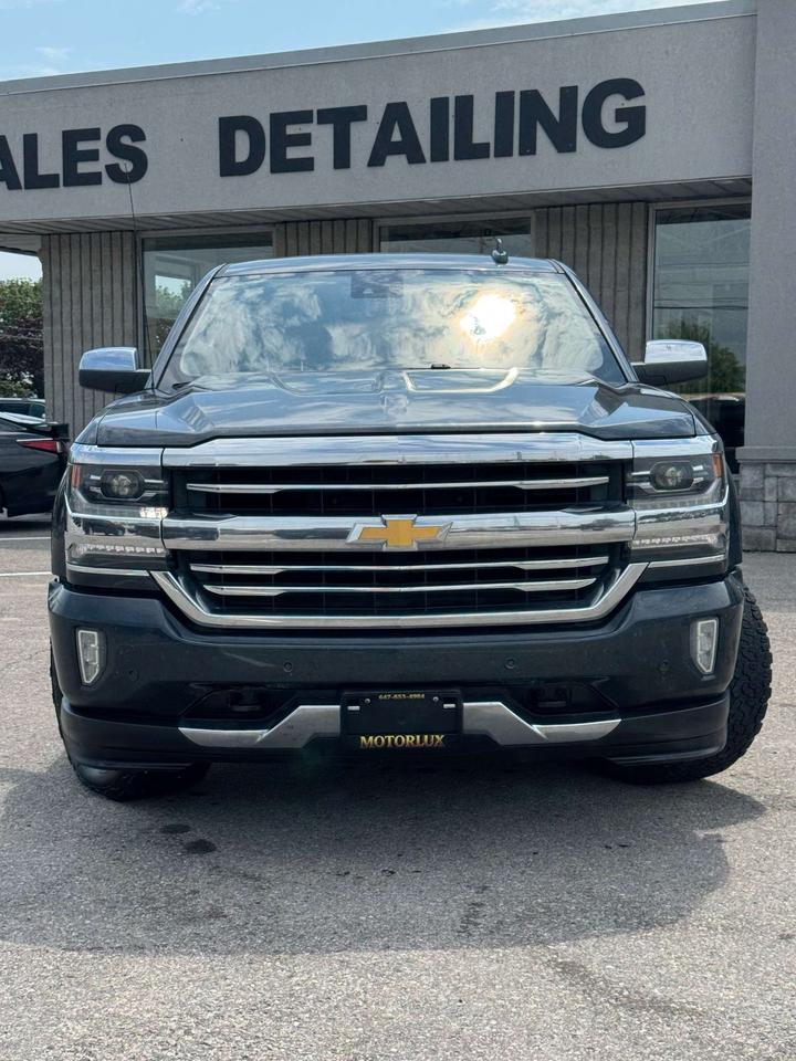 2017 Chevrolet Silverado 1500 4WD Crew Cab 143.5 High Country 5'8 Lined Box Photo
